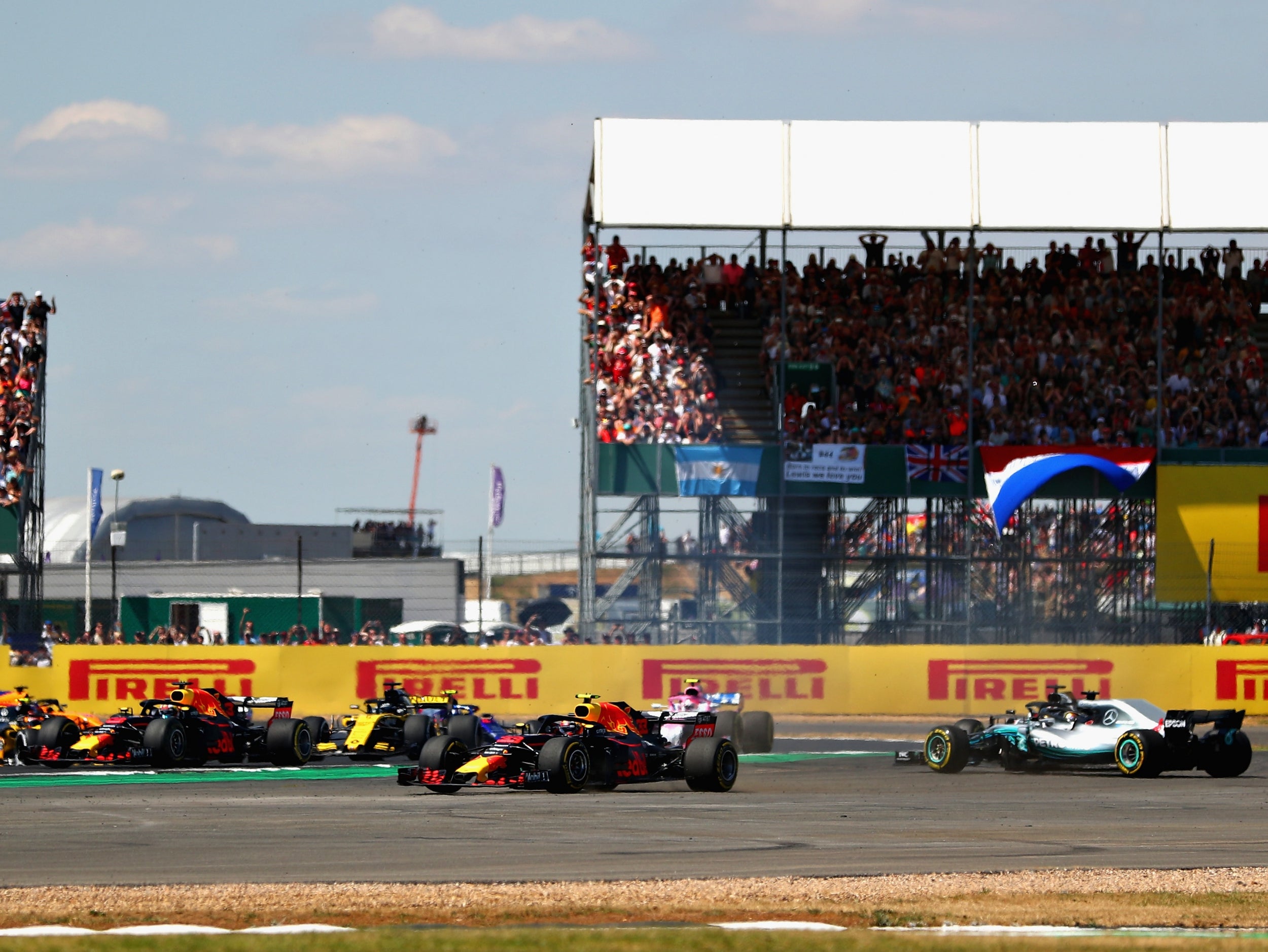 Hamilton spins after contact from Kimi Raikkonen at the third corner(Getty)