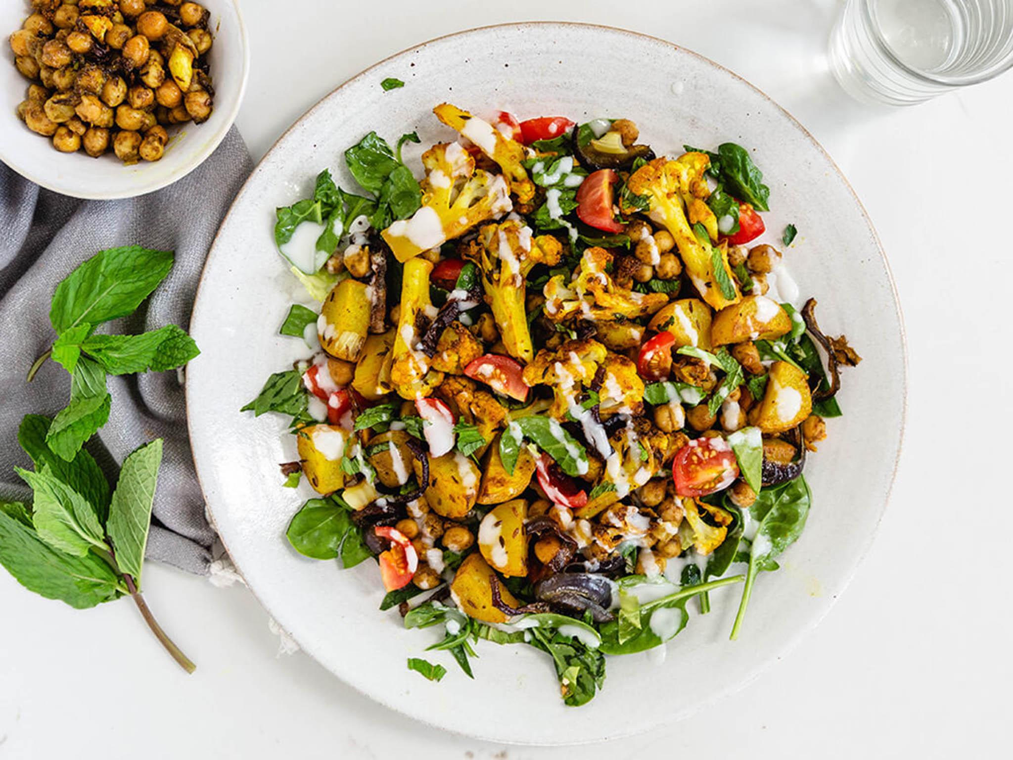 Cauliflower, spinach and tomato complement this crunchy affair