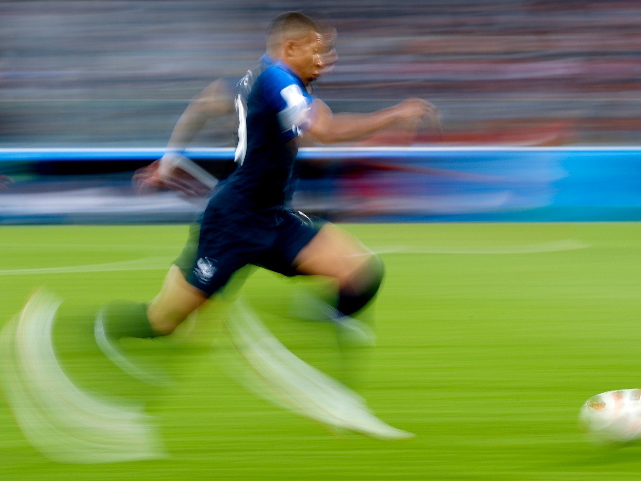 France’s Kylian Mbappe runs with the ball