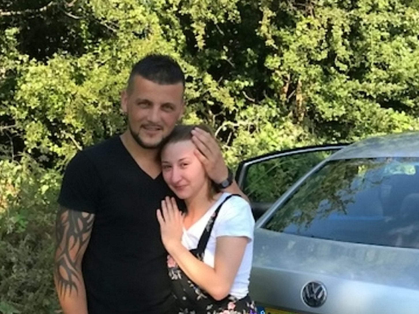 PC Nuttall took a photo of the young couple standing beside their silver Volkswagen