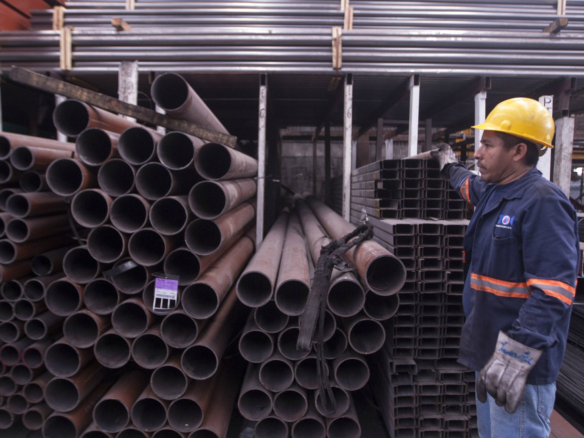 A man works in a steel distribution factory in Monterrey in northern Mexico, after the US President Donald Trump slapped steep tariffs on steel and aluminium from Mexico, Canada, and the European Union.