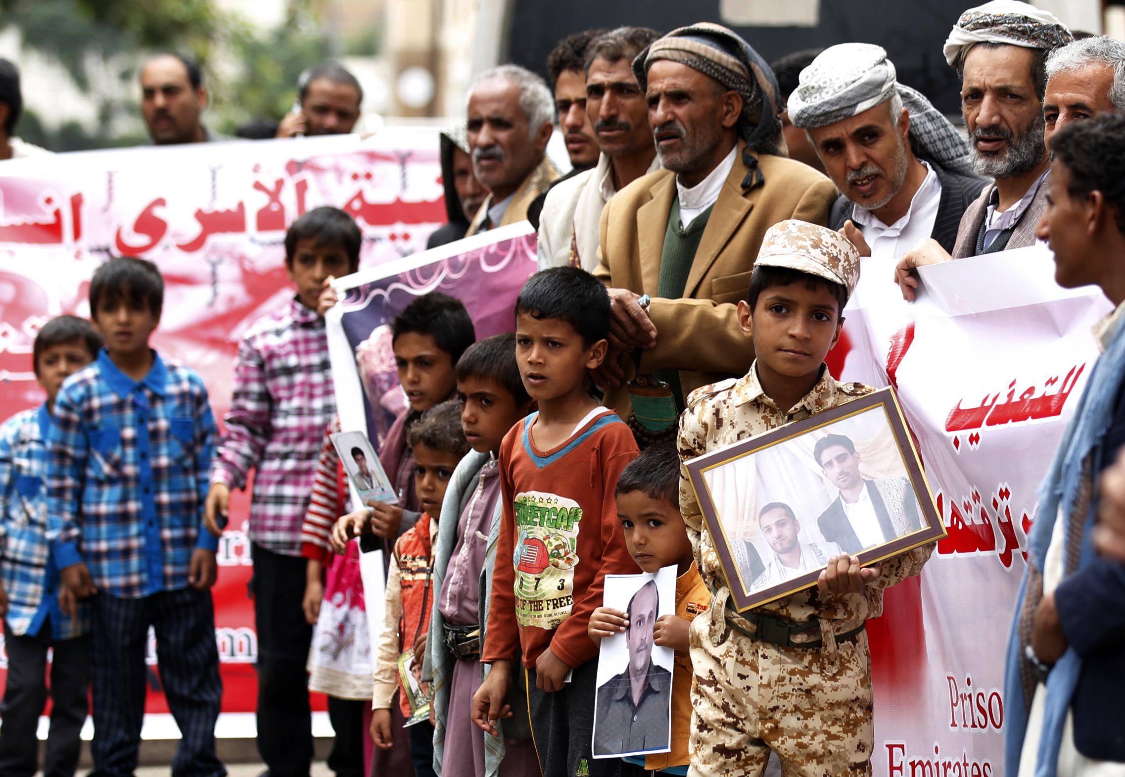 Yemeni protesters shout slogans calling for the release of prisoners during a demonstration in Sanaa