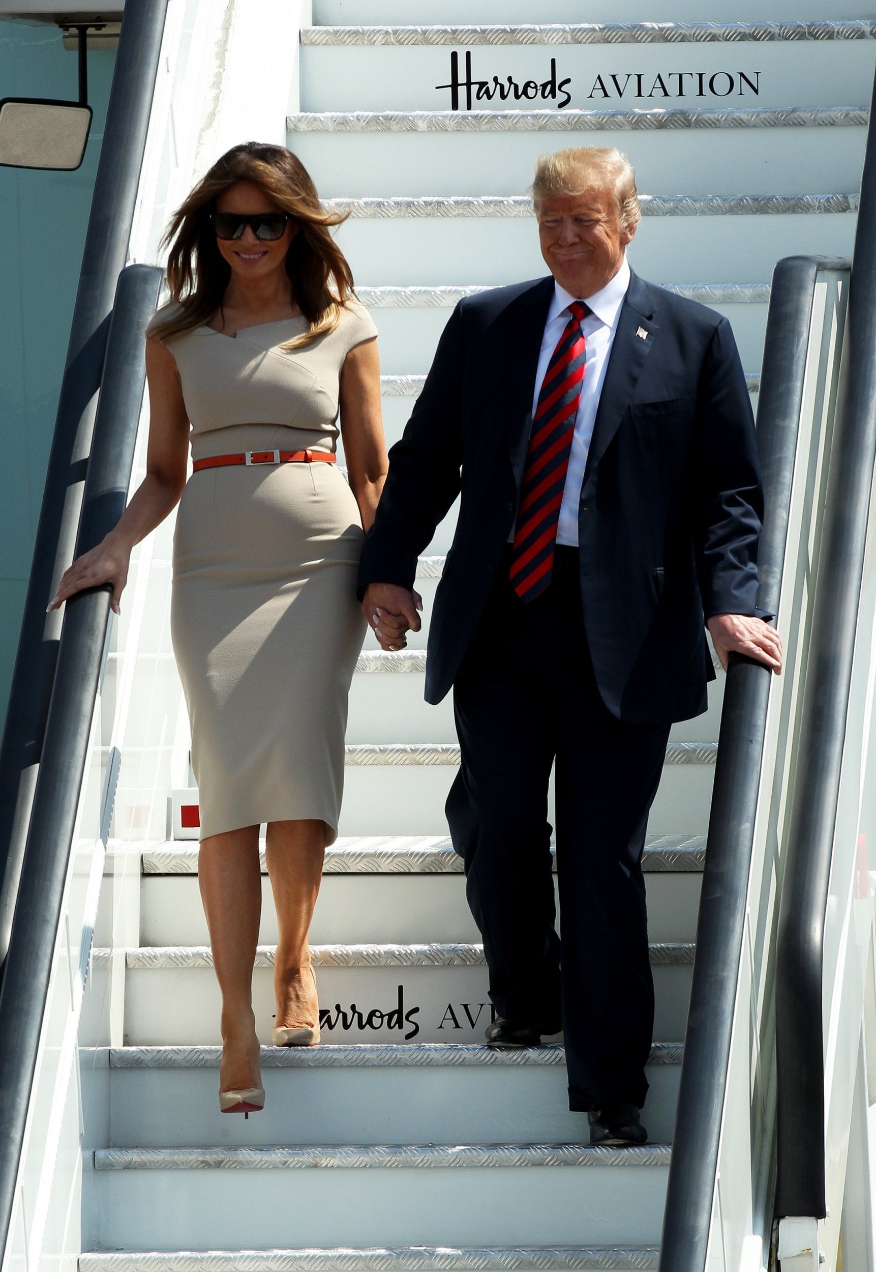 The First Lady wore a nude dress for the visit