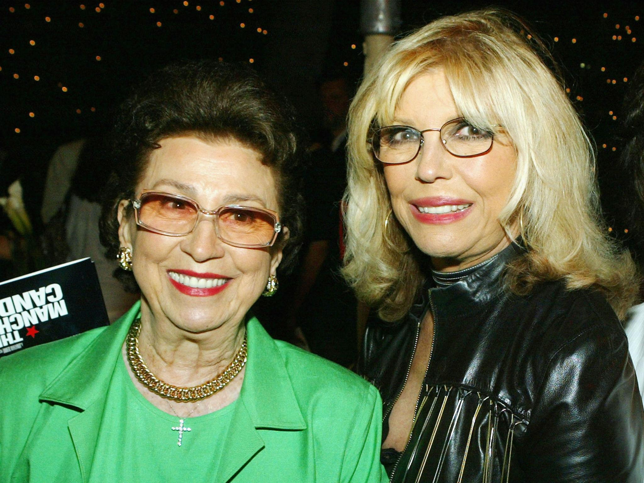 Nancy with her daughter Nancy Jr in 2004 (Kevin Winter/Getty)