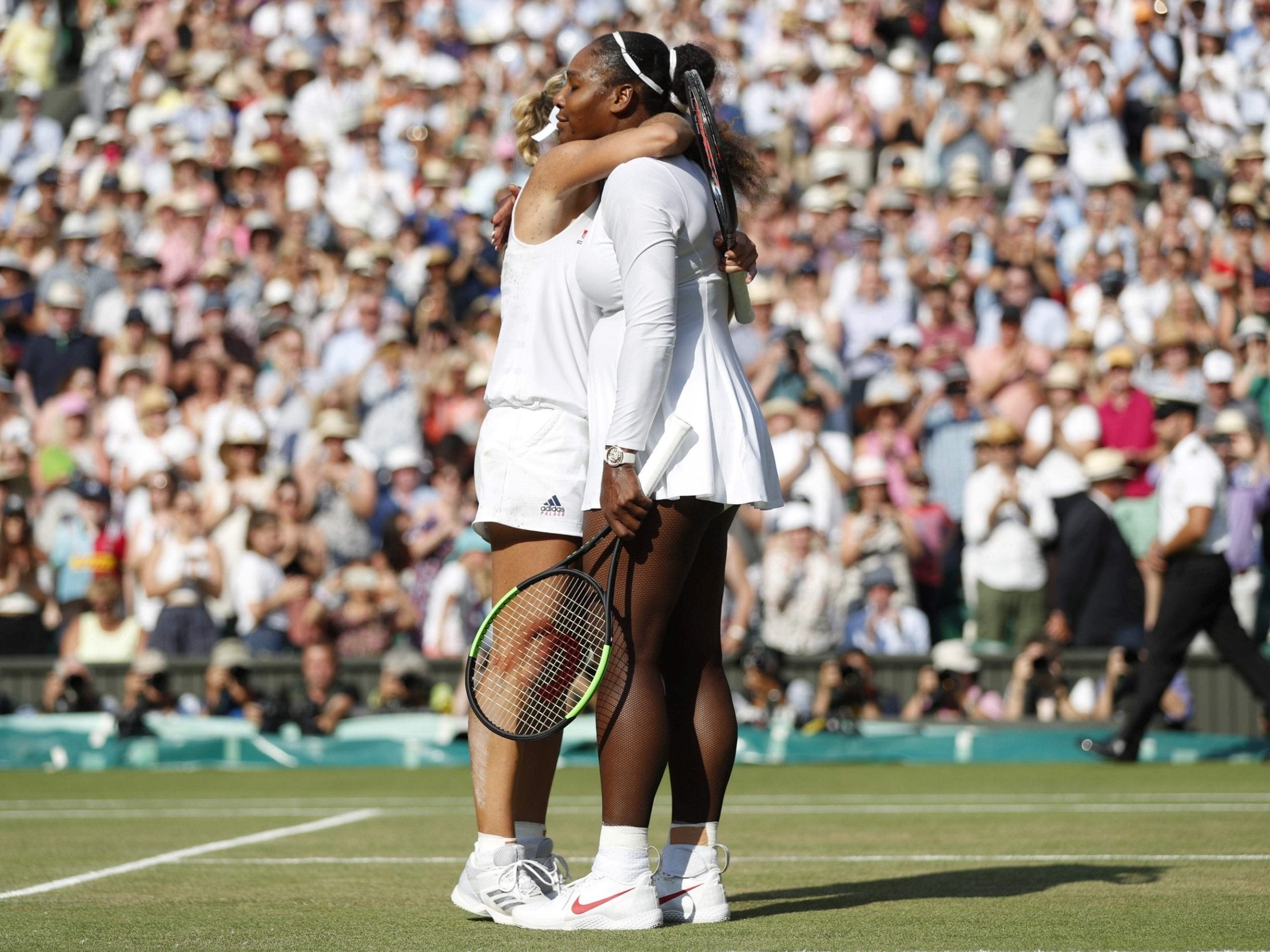 Kerber embraces Williams after winning the Wimbledon title