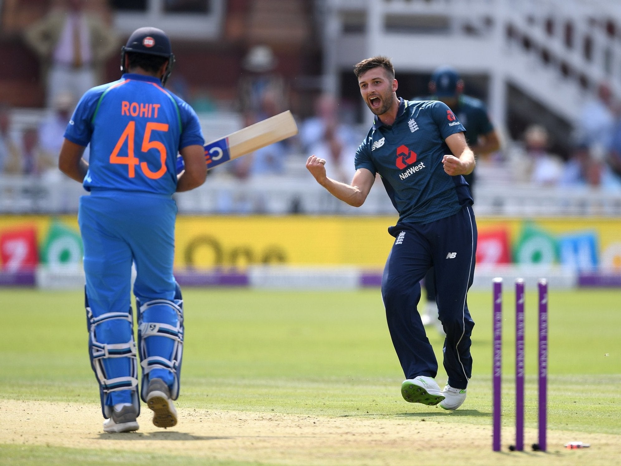 Mark Wood celebrates dismissing Rohit Sharma