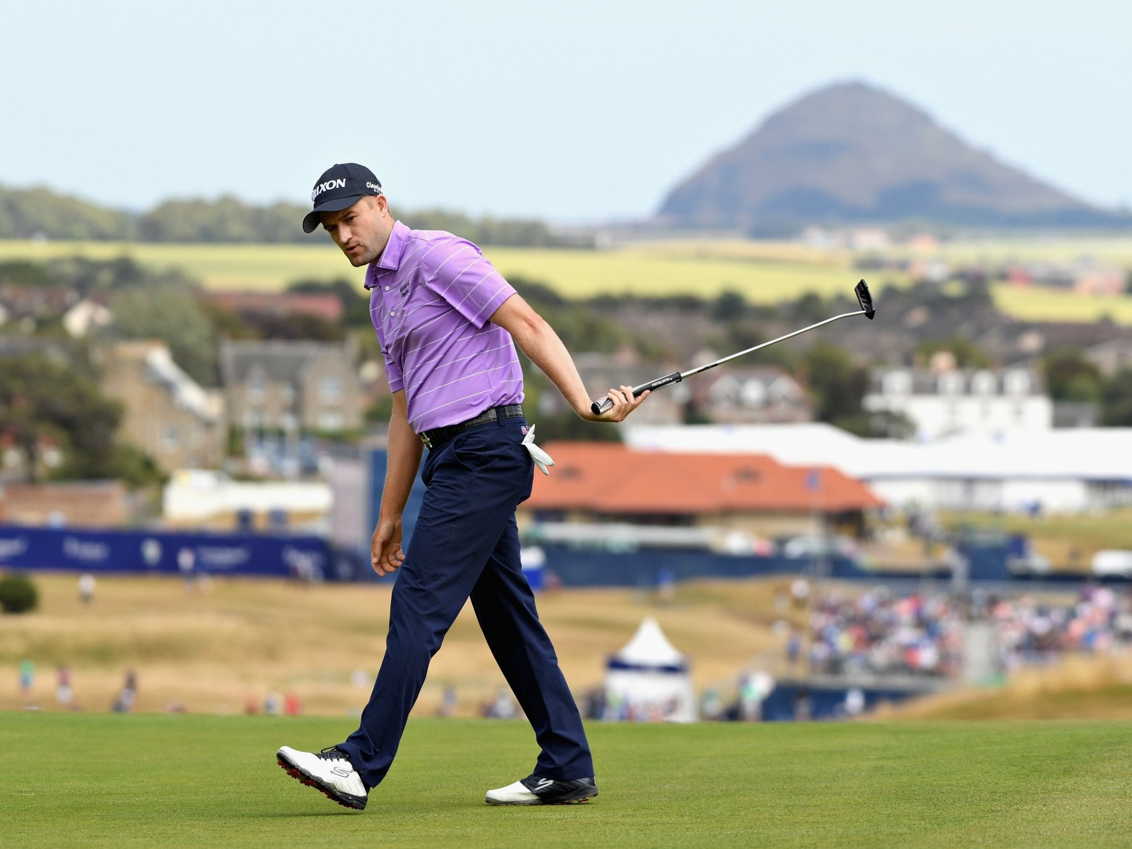 Russell Knox reacts to a missed birdie putt