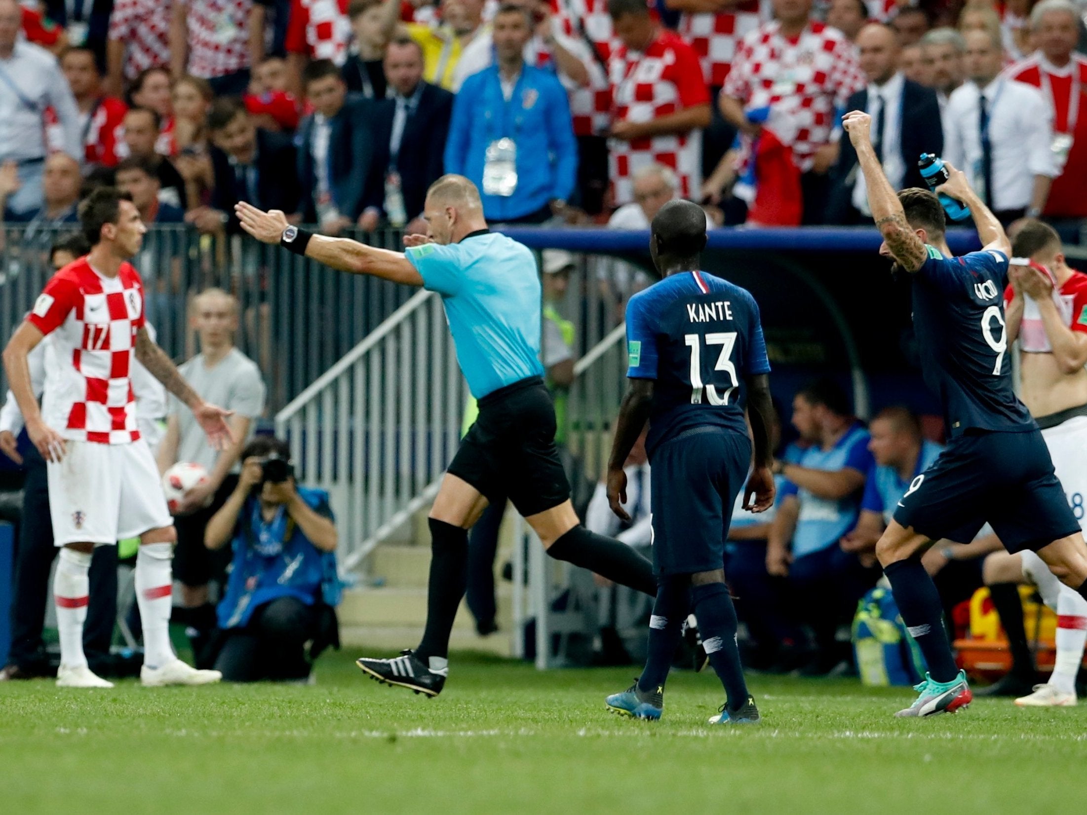 Referee Nestor Pitana from Argentina points to the penalty box