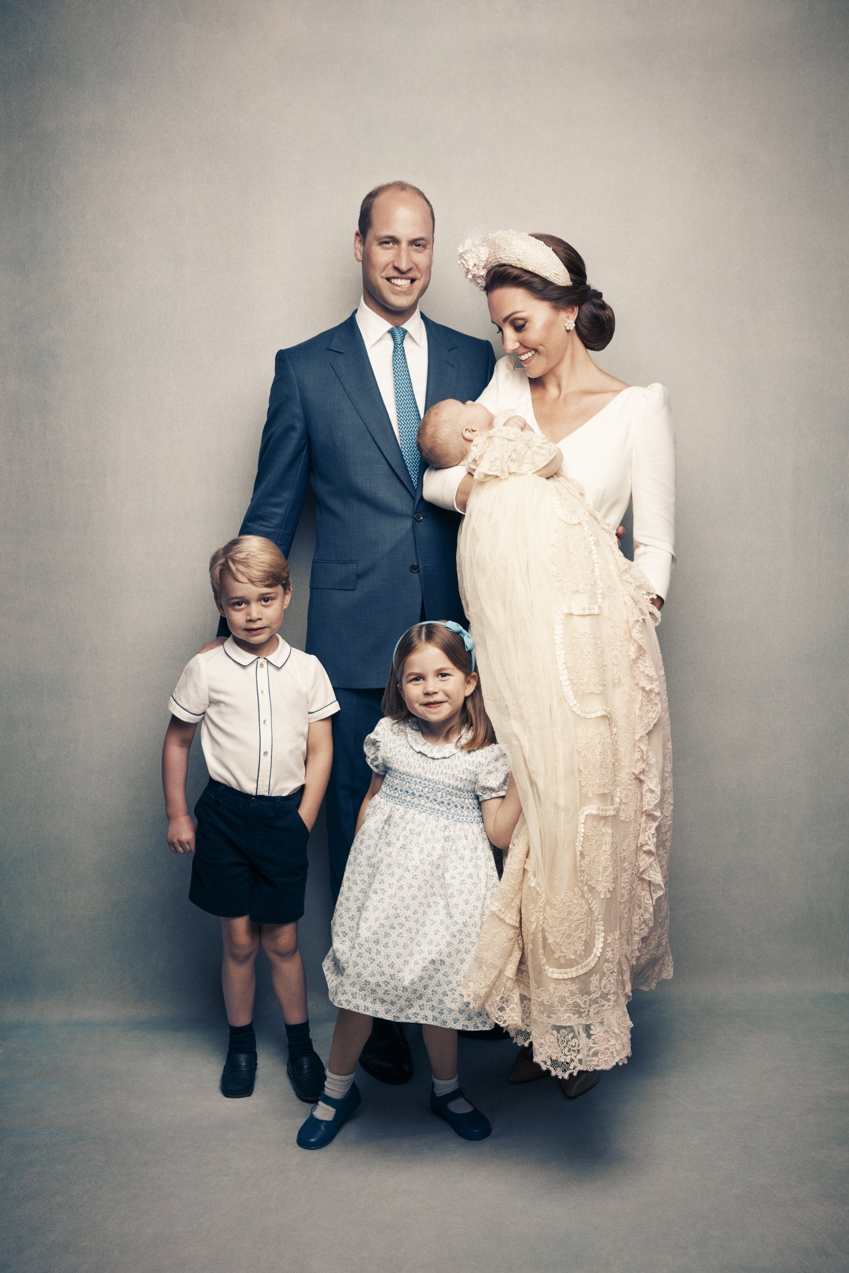 The Duke and Duchess of Cambridge, Prince George, Princess Charlotte and Prince Louis pose for an Official Portrait following the christening of Prince Louis taken in the Morning Room at Clarence House in St James's Palace on July 9, 2018.