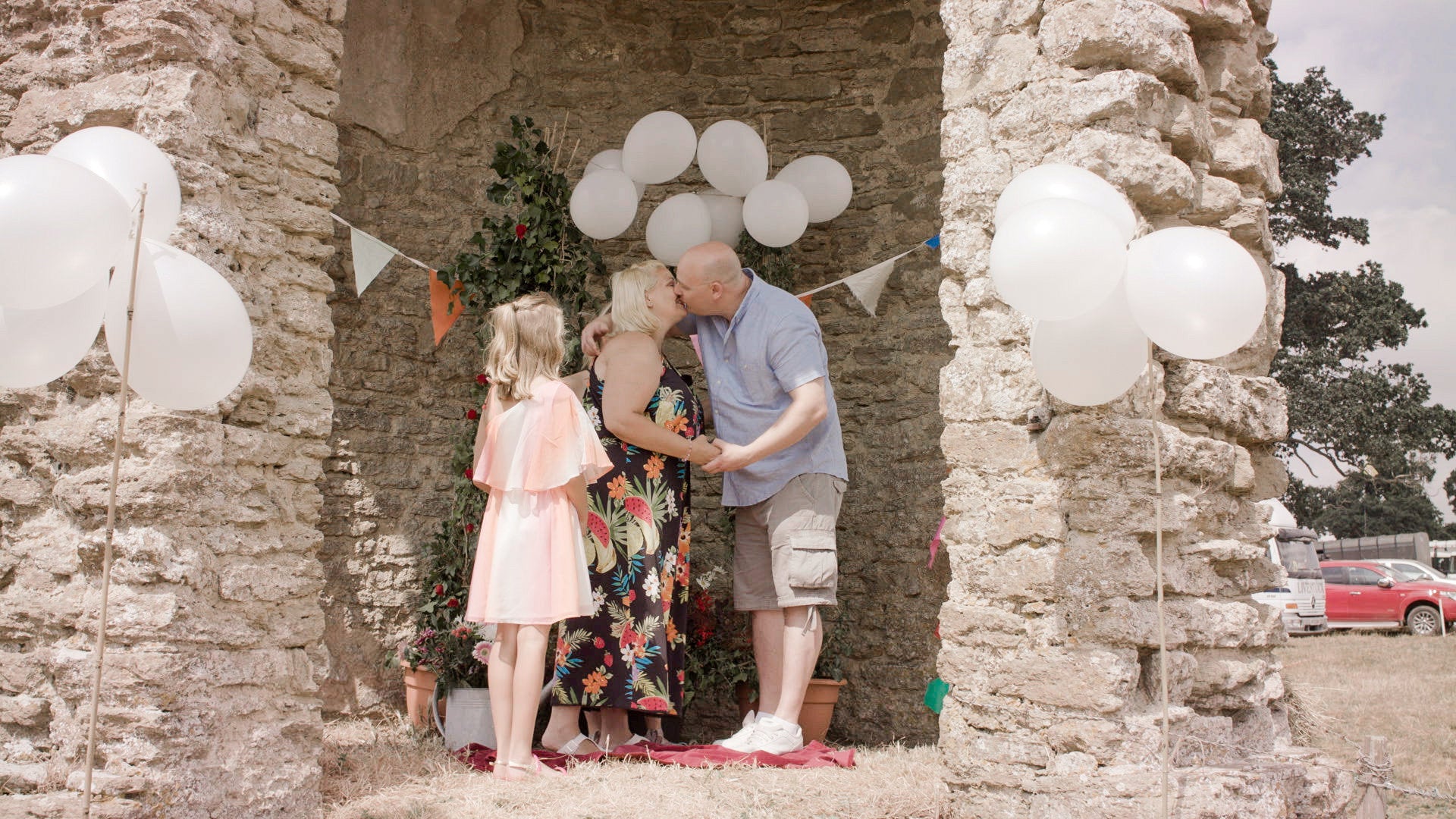 This is the touching moment a woman proposed to her partner - and her daughter asked him to adopt her at the same time