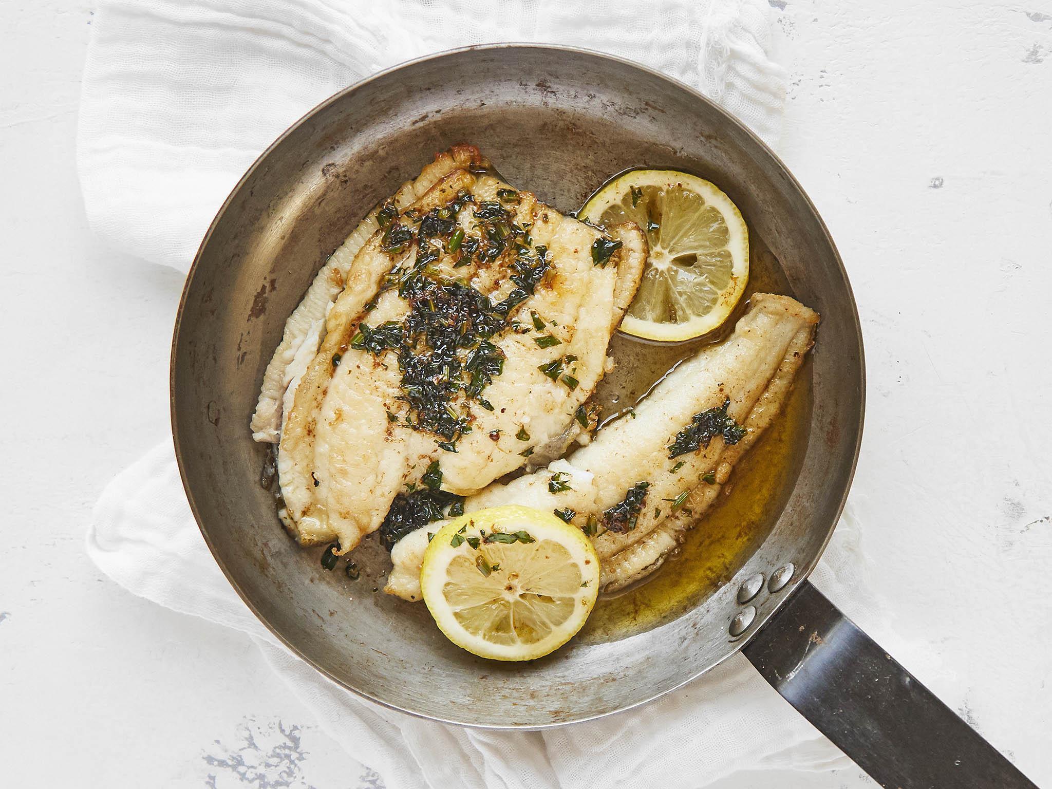 To complete the meal, serve with lemon, some new potatoes and green beans