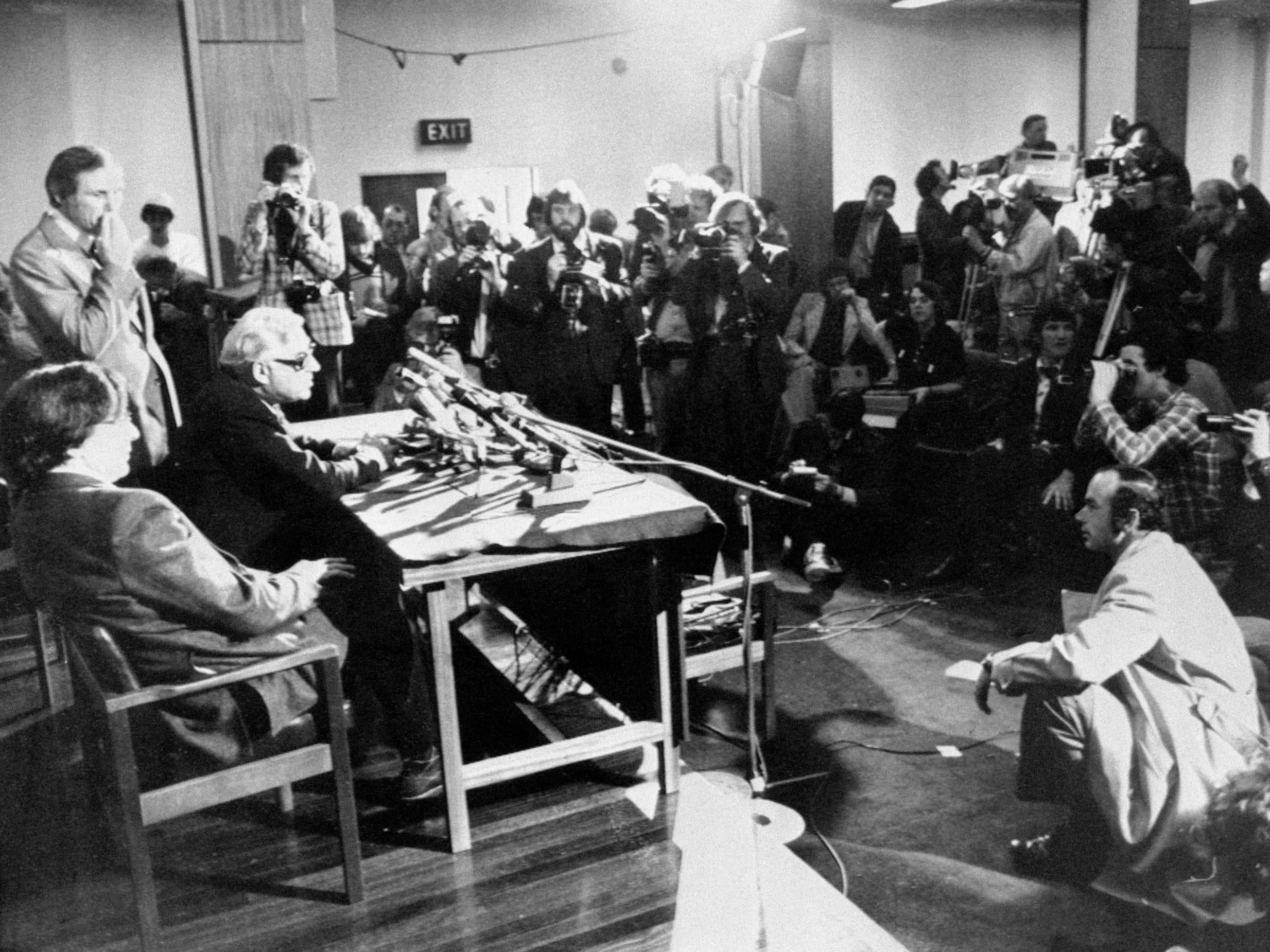 Consultant gynaecologist Patrick Steptoe (seated left) and physiologist Dr Robert Edwards (seated extreme left) address the press at Oldham General Hospital on 25 July 1978