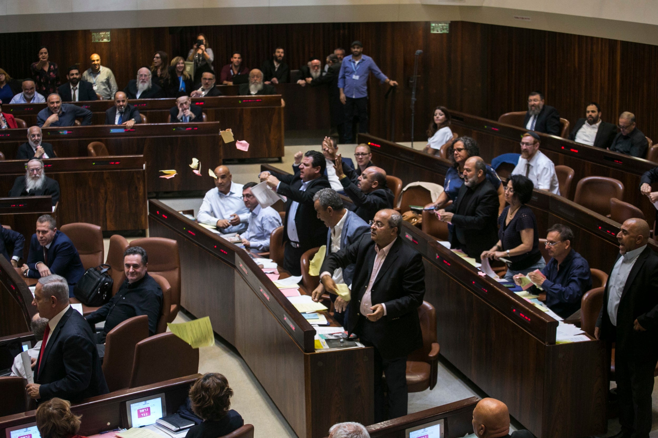 Arab lawmakers stand up in protest