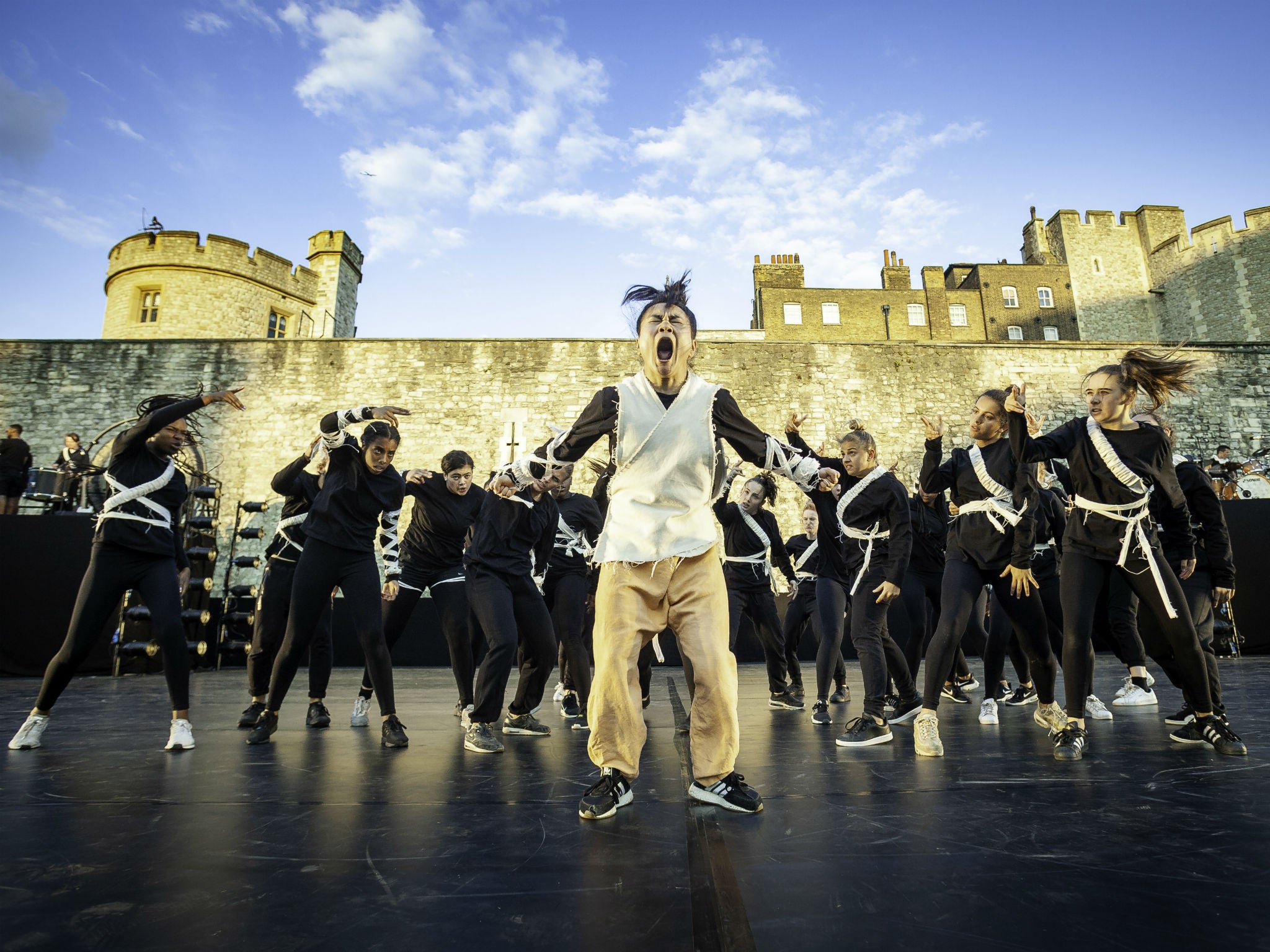 The performance is the first time the Tower of London moat has been used for a large-scale work since the poppies installation