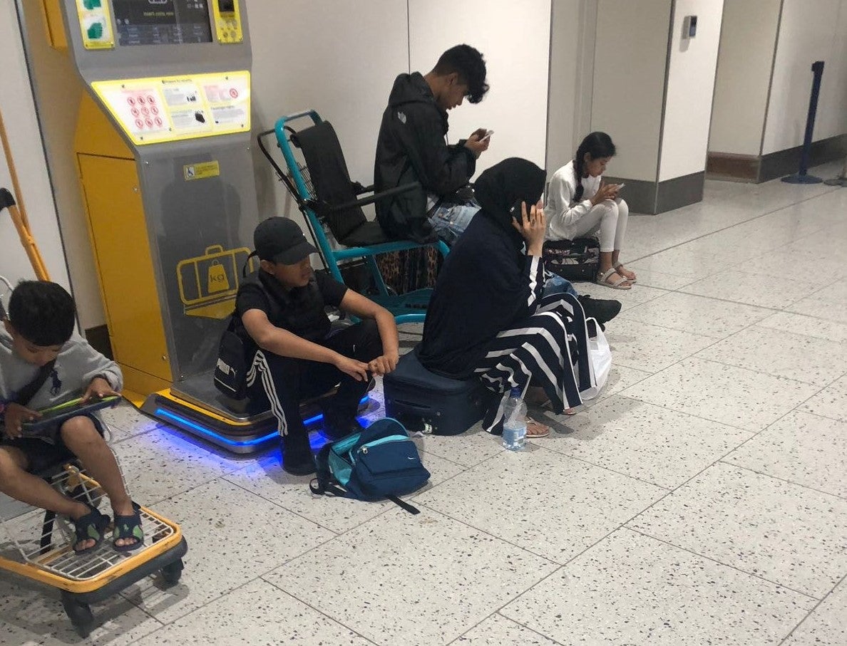 Mr Ahmed said his family were left waiting on the floor in the airport for more than two hours after missing their flight due to the questions over Ms Begen's passport