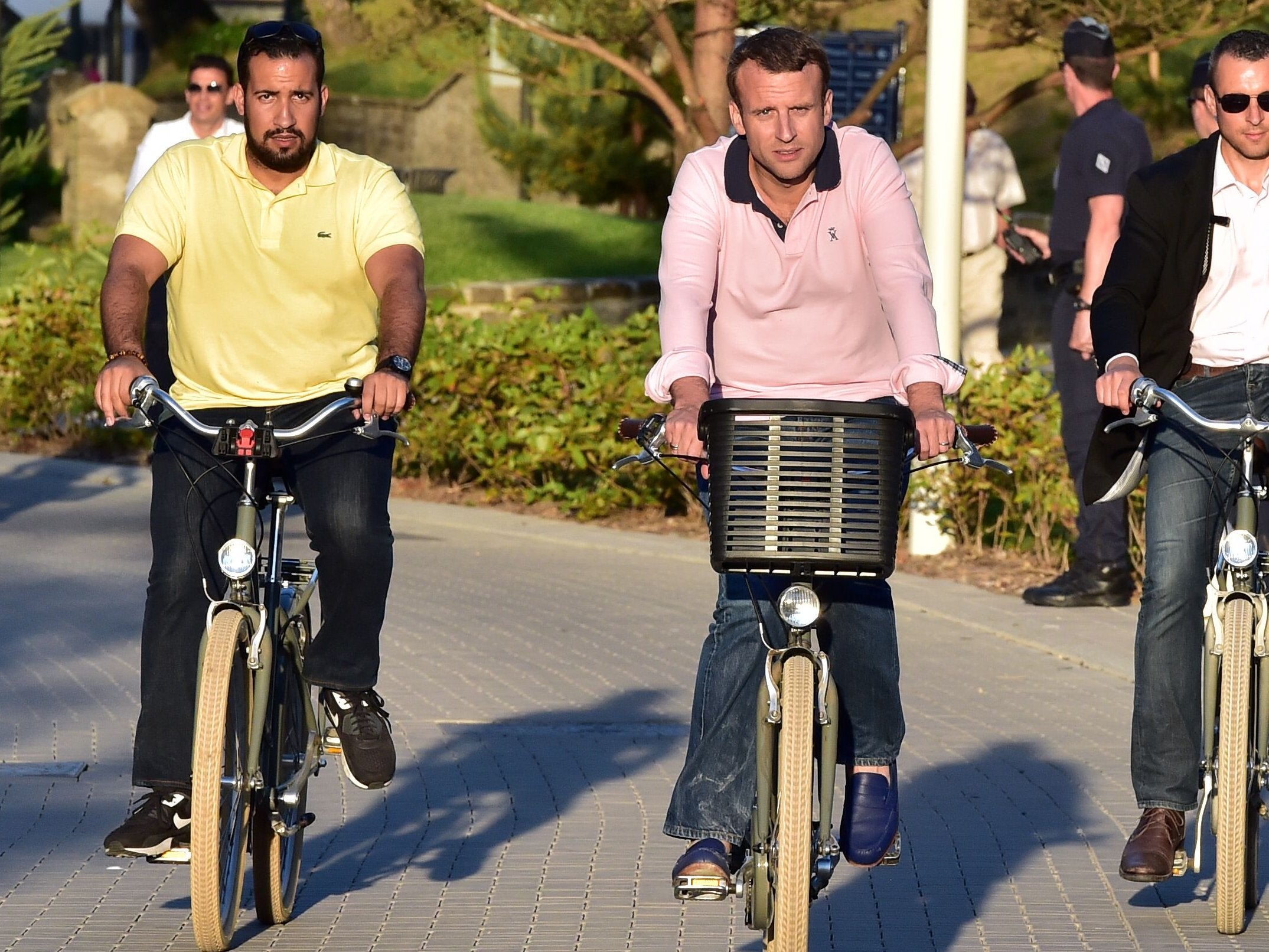 Mr Benalla (L) has been at the centre of a potentially damaging scandal for Mr Macron after he was filmed hitting a protester