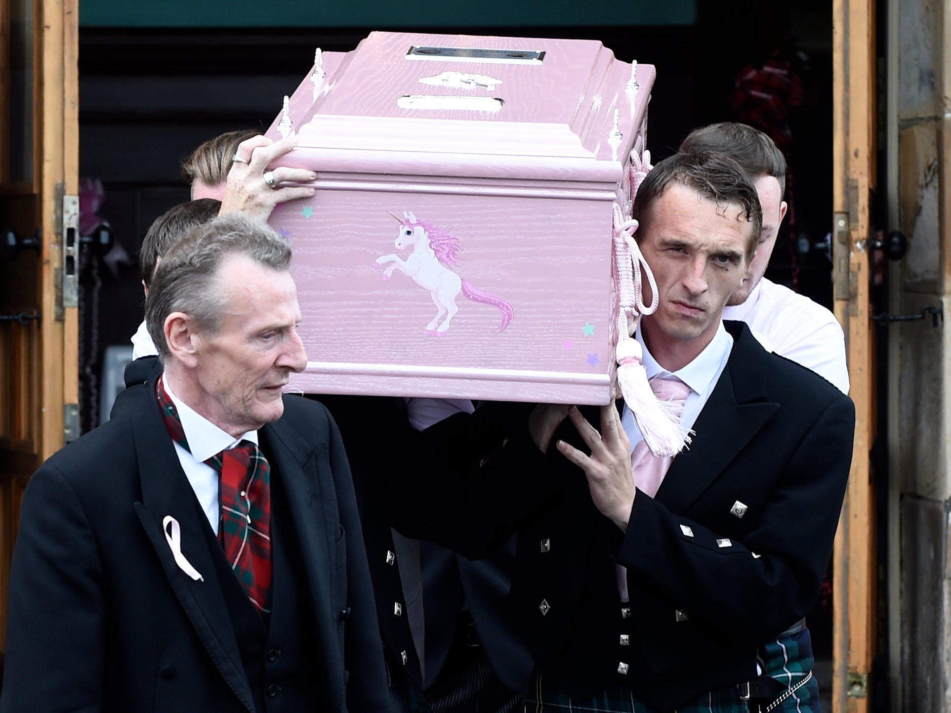 The coffin taken from the Coats Funeral Home, in Coatbridge, Scotland, after the funeral of six-year-old Alesha MacPhail, whose body was found on the Isle of Bute earlier this month