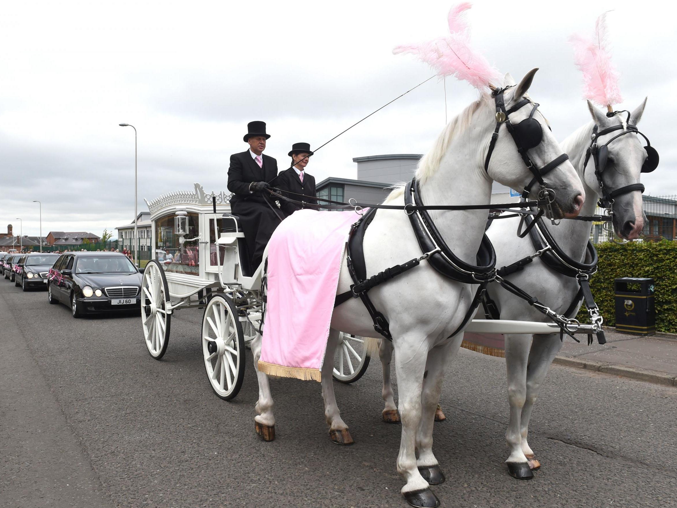 Funeral cortege arrives at the Coats Funeral Home, in Coatbridge, Scotland, prior to the funeral of six-year-old Alesha MacPhail, whose body was found on the Isle of Bute earlier this month