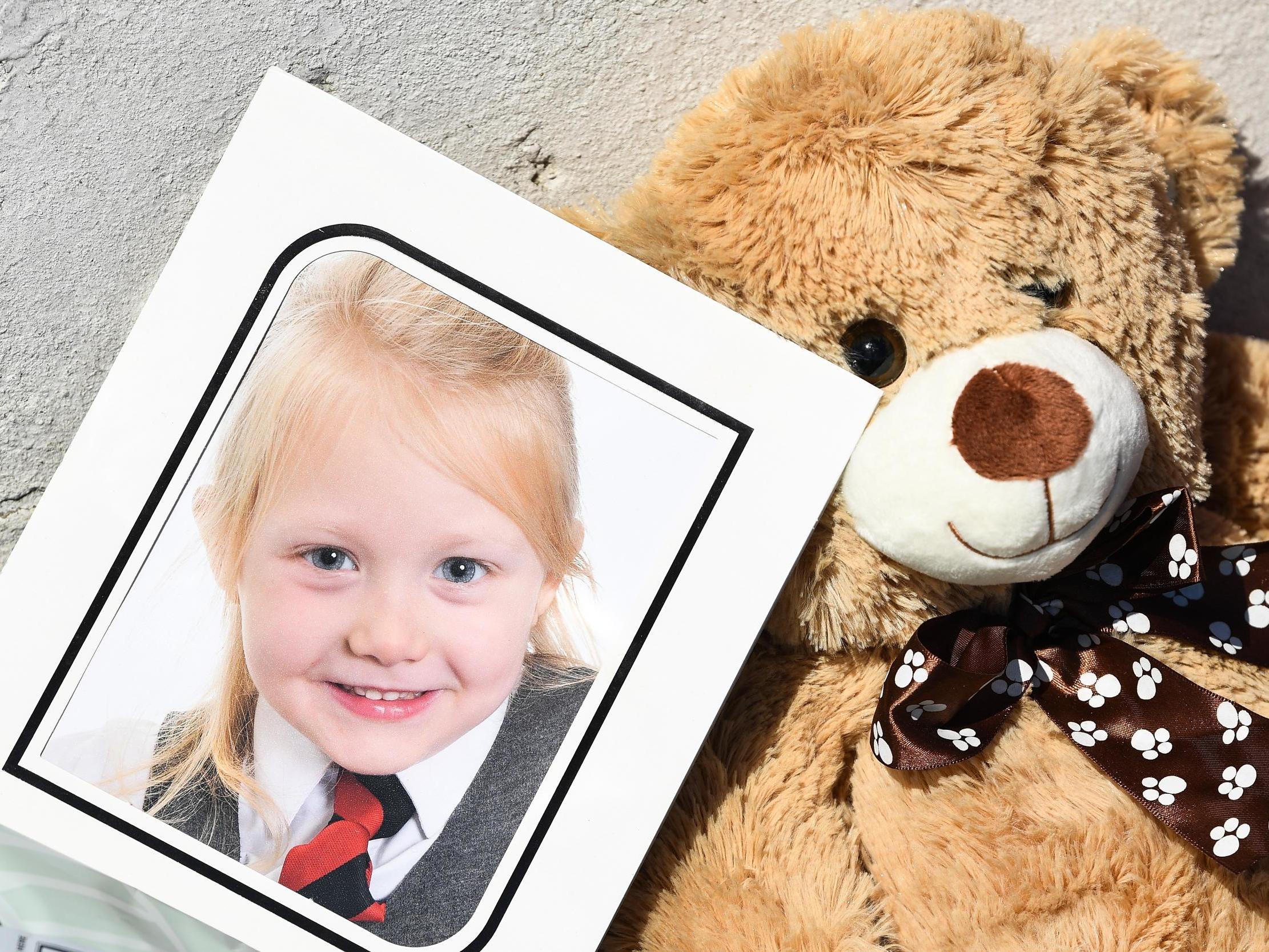 Tributes are left at a house on Ardbeg Road on the Isle of Bute, in Scotland, after six year old schoolgirl Alesha MacPhail was murdered on July 4, 2018