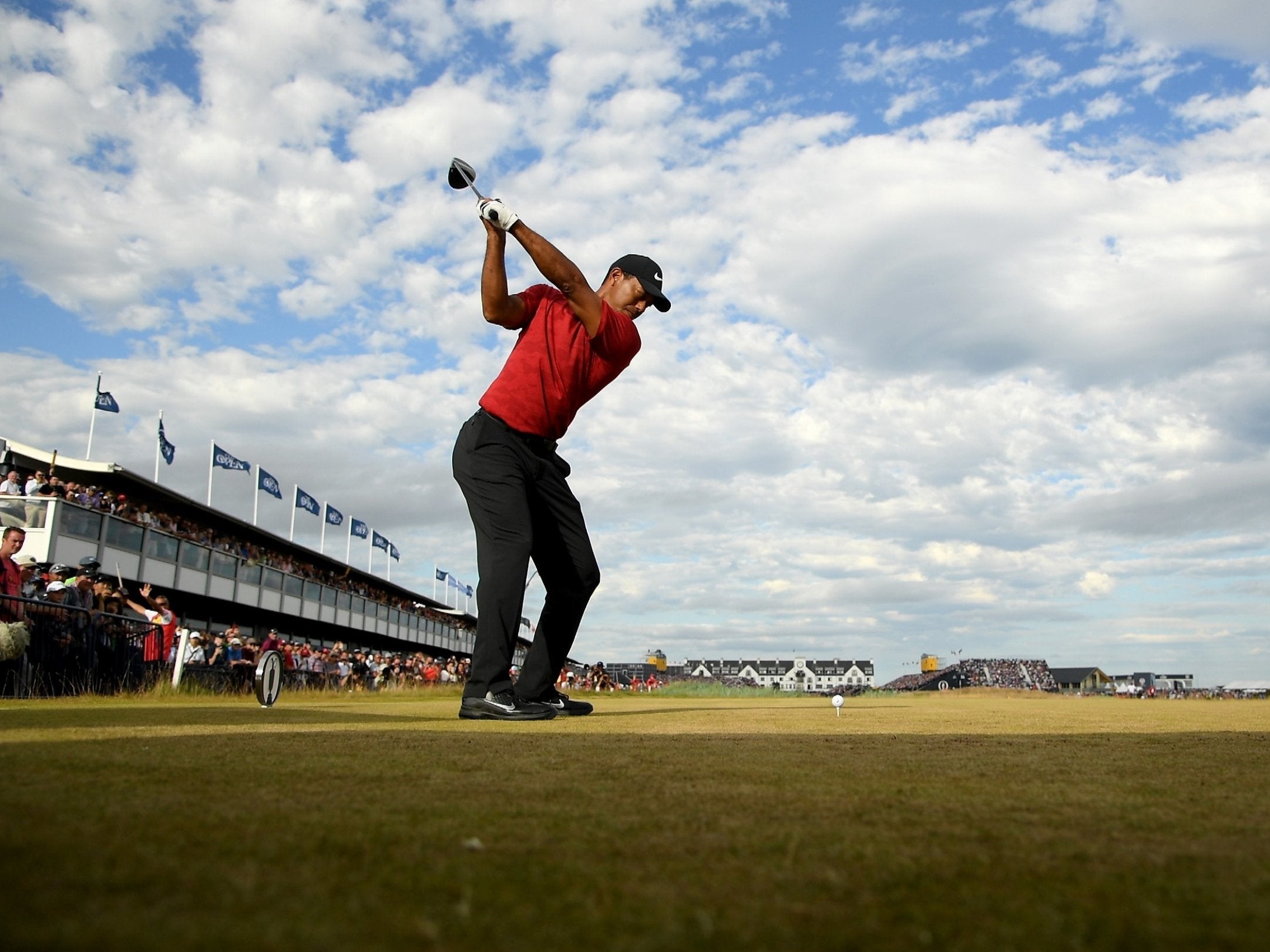 Woods was interrupted on the 18th tee (R&amp;A via Getty Images)