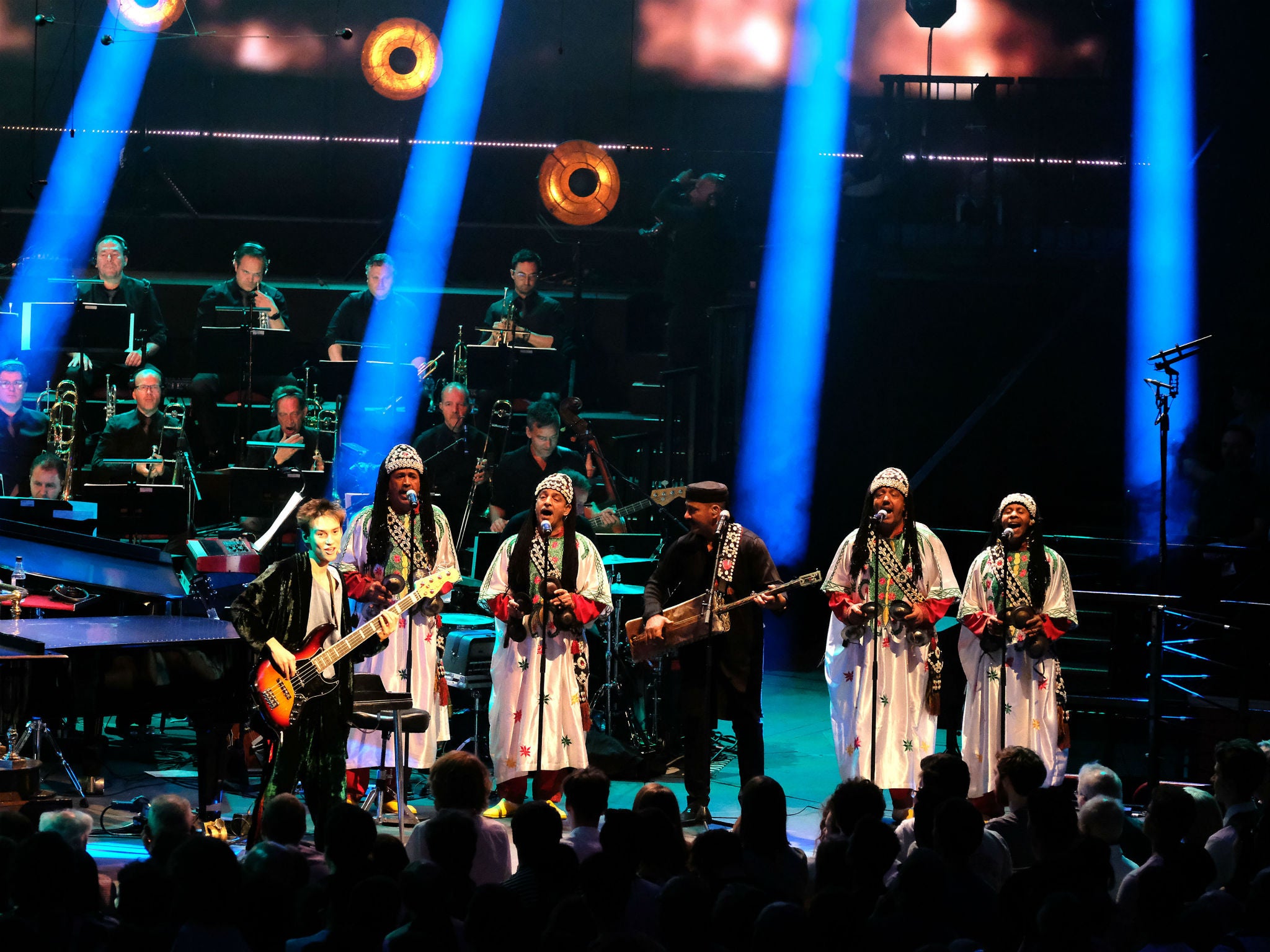 Drowned out: Collier (left) with El Kasri and his backing group