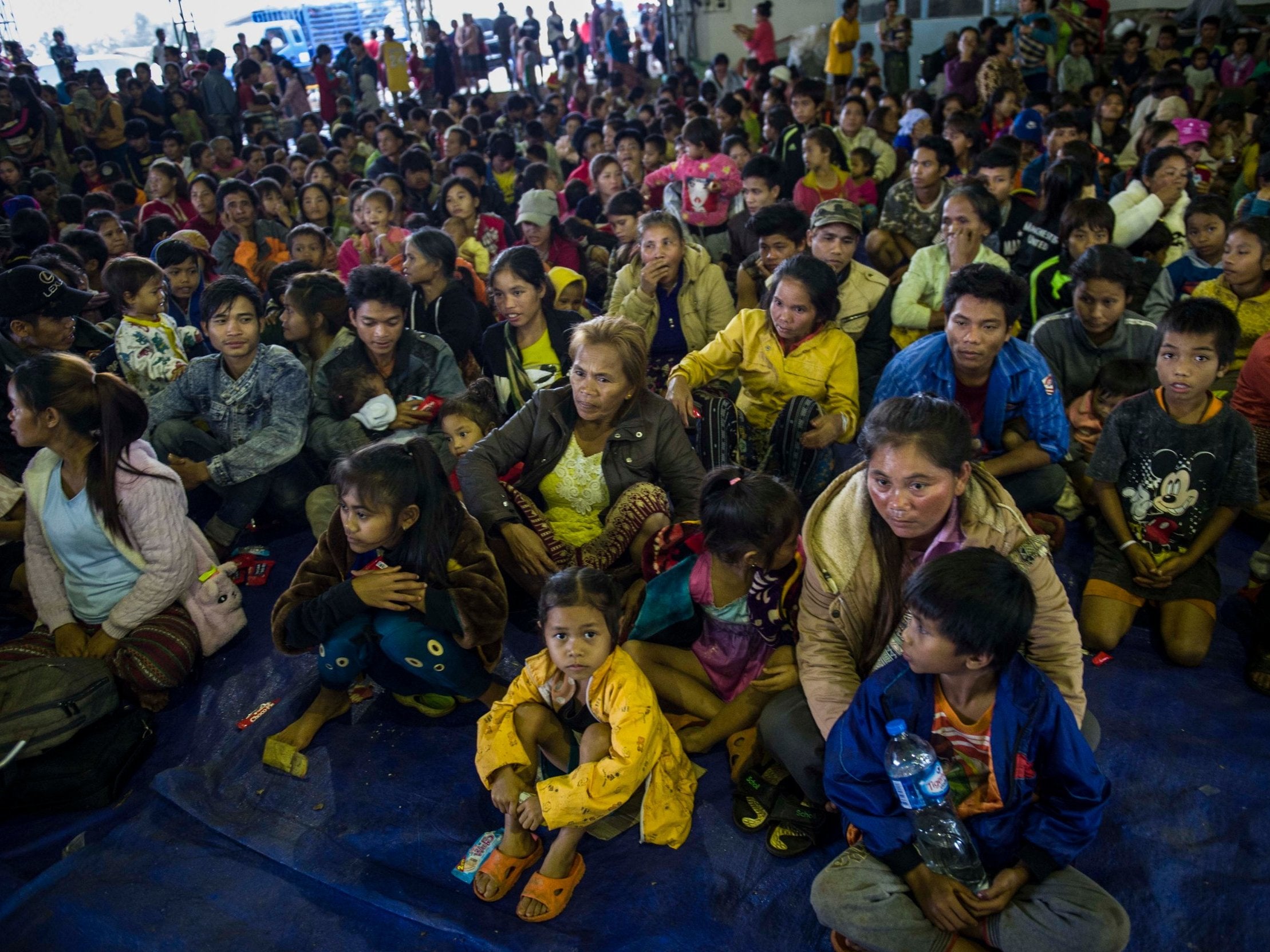 Residents displaced by massive flood waters from the collapsed dam seek shelter in Paksong town in Champasak province (AFP/Getty)