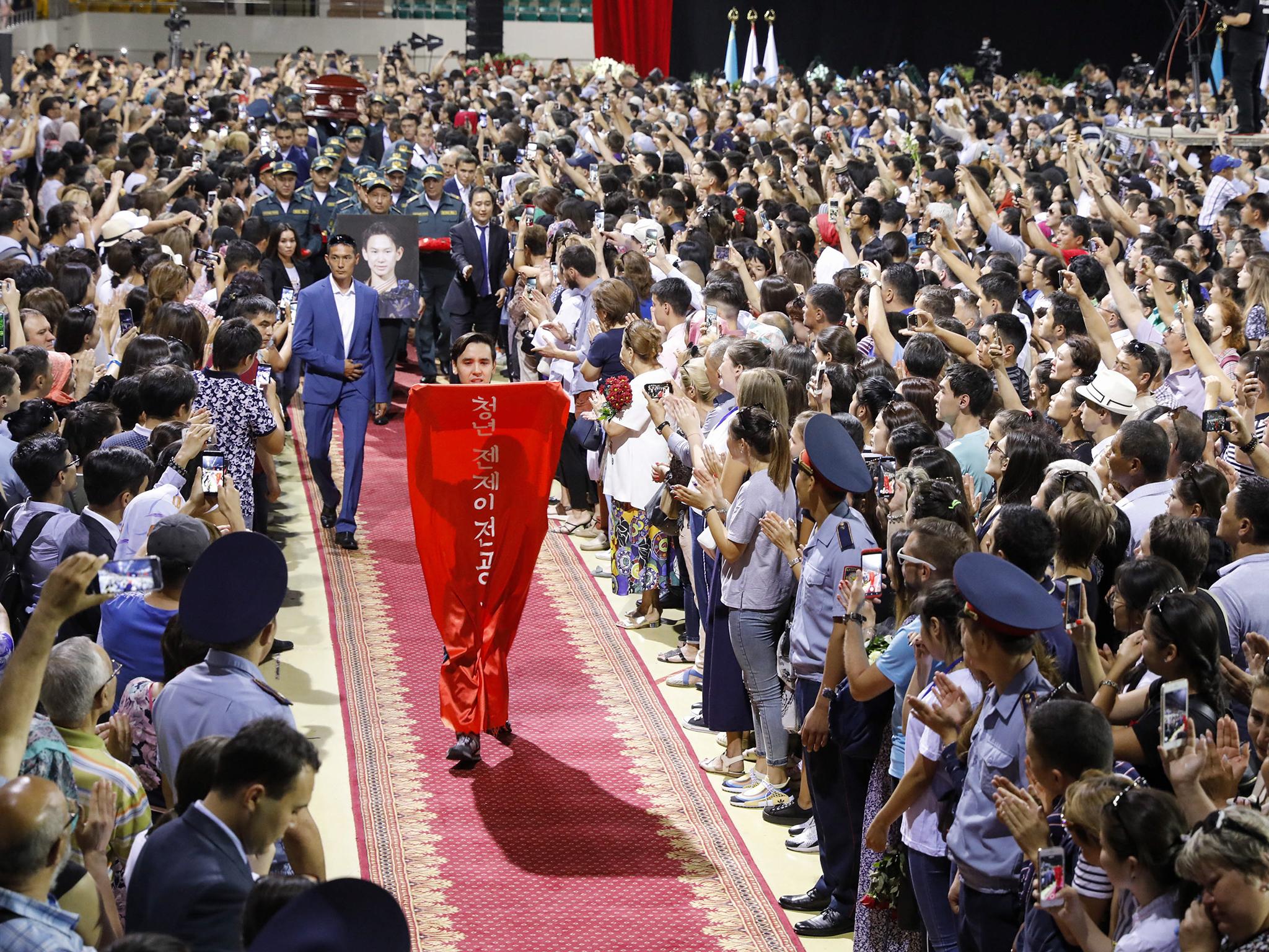 Thousands filled the Baluan Sholak Sports Palace for Ten’s funeral in Almaty (Tass)