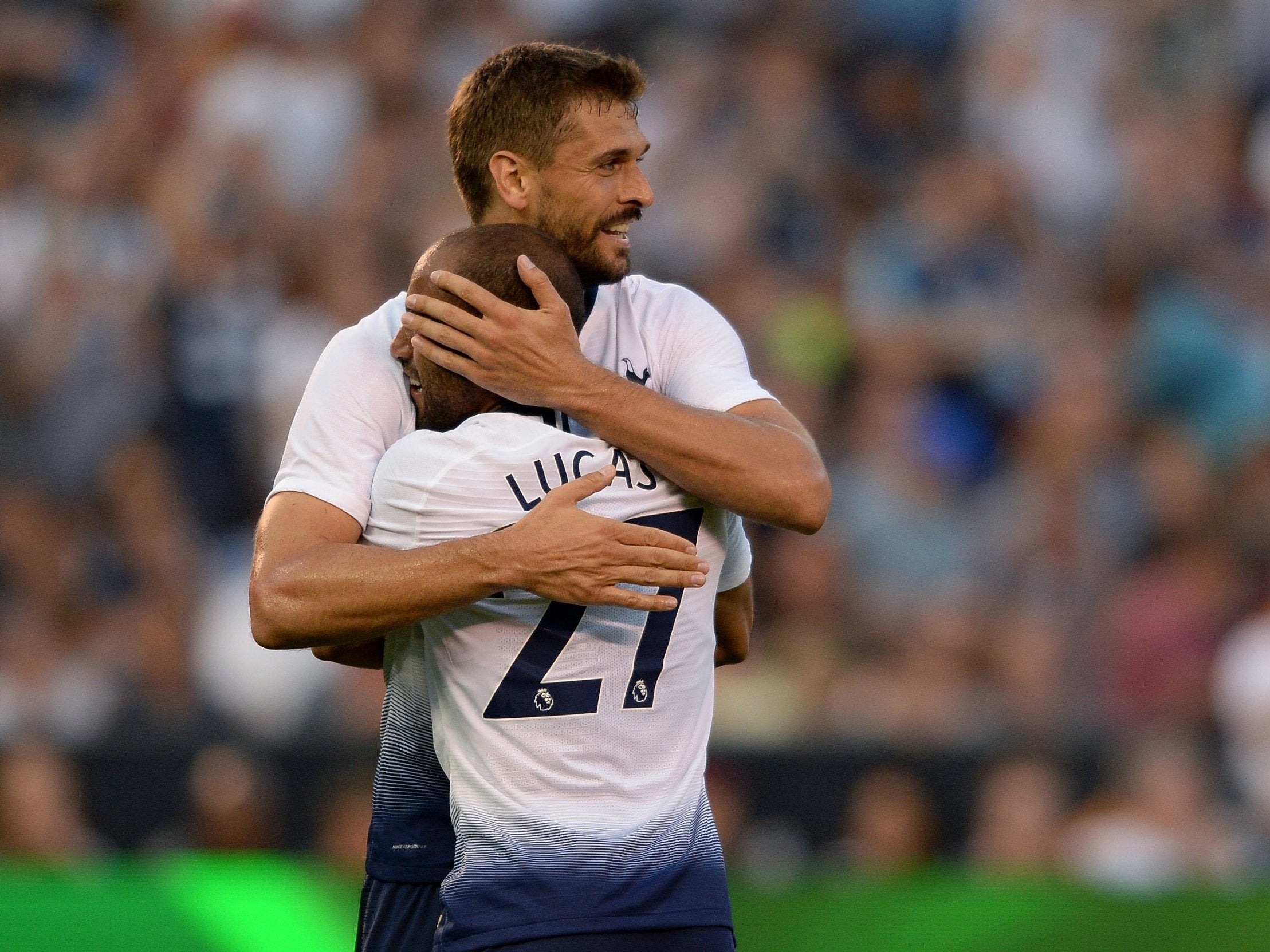 Fernando Llorente embraces Lucas Moura after scoring for Spurs