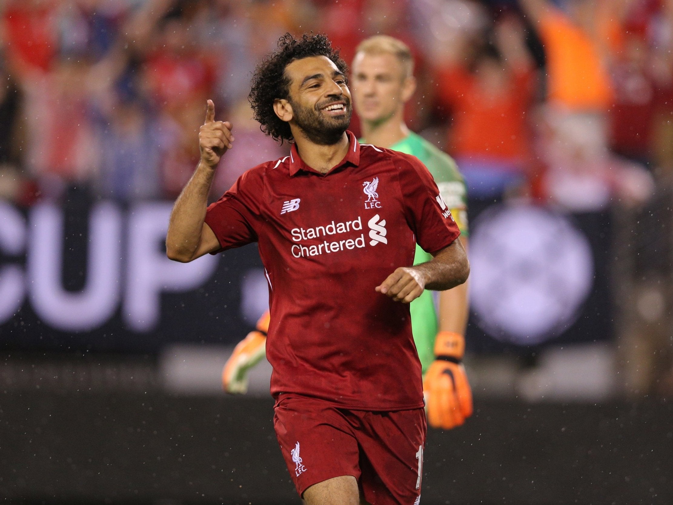 Mohamed Salah celebrates after scoring for Liverpool 35 seconds after coming on