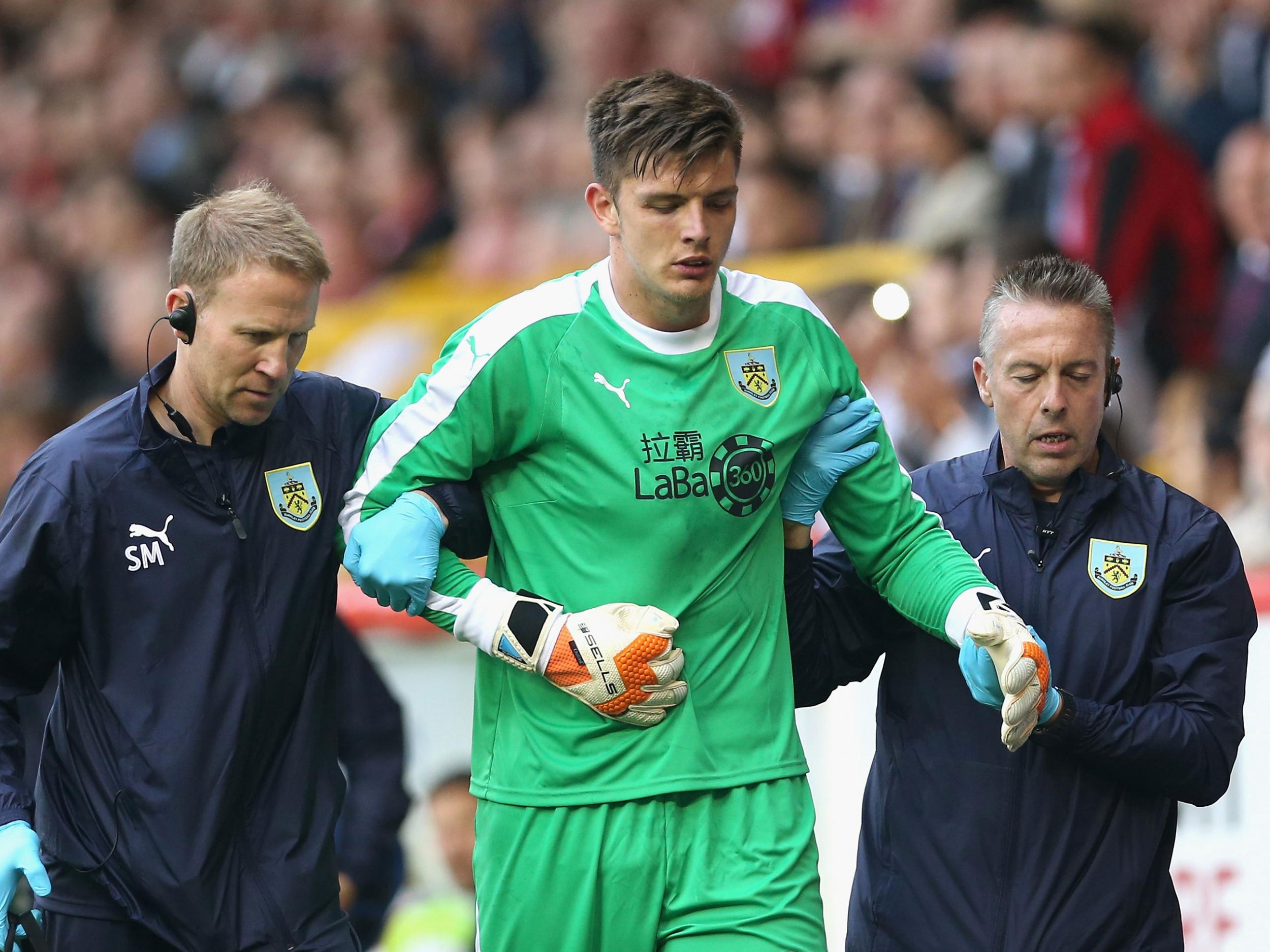 Burnley goalkeeper Nick Pope was forced off during the first half