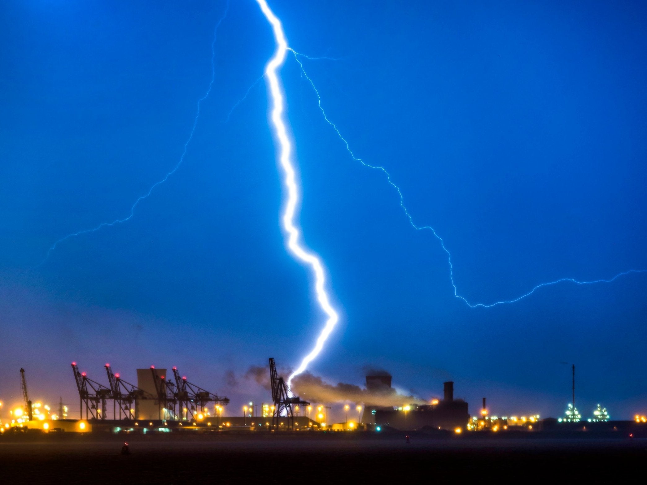 Lightning flashes over Humber estuary near Hull as clouds obscure a view of the blood moon, the longest lunar eclipse of the century which sees Earth’s natural satellite turn blood red