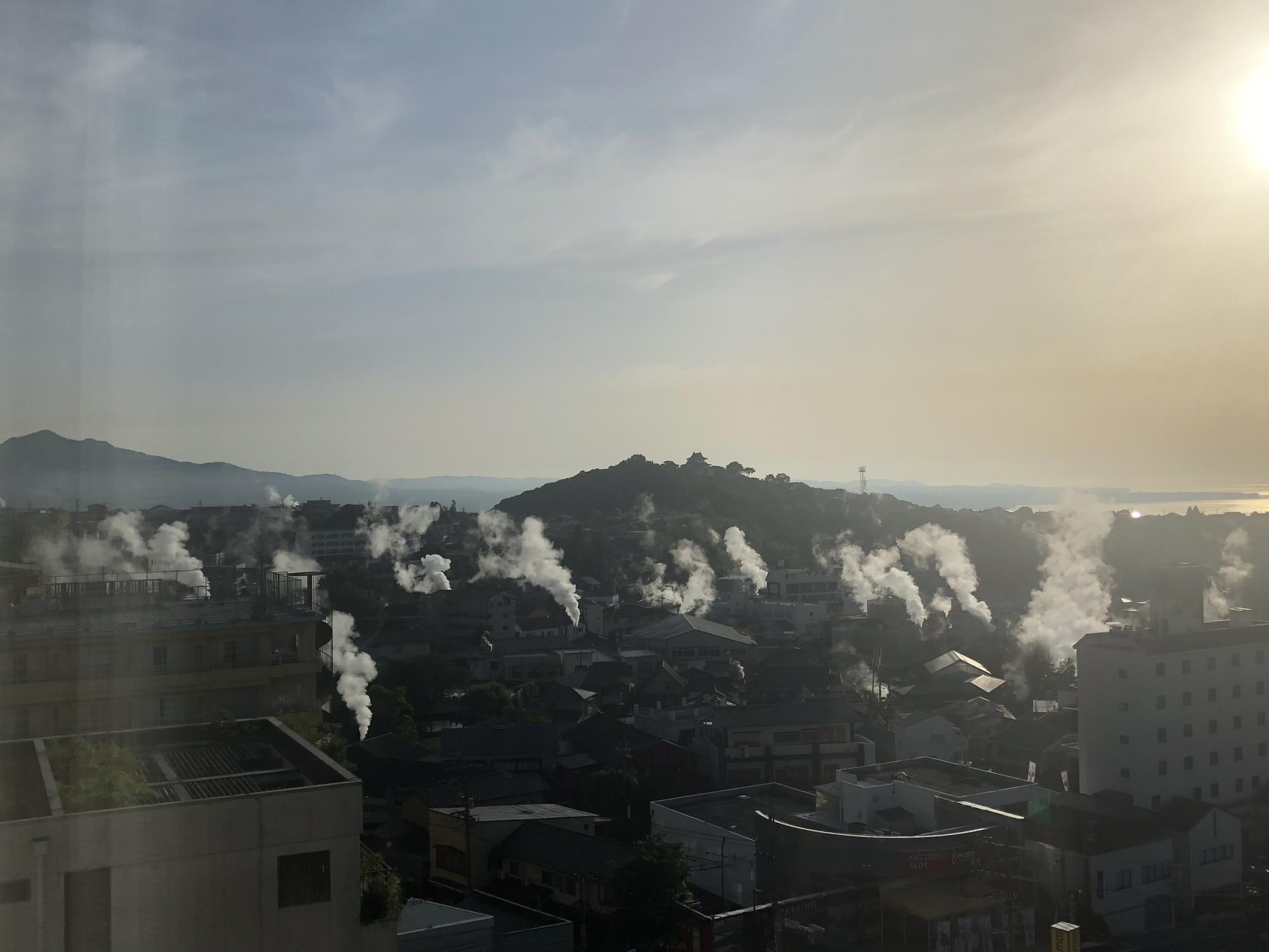 Visitors can see the steam rising from various onsens throughout Beppu