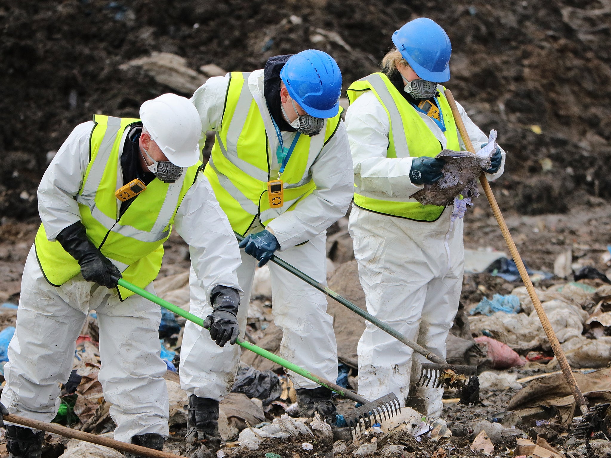 Police officers search a landfill site while searching for missing RAF airman Corrie McKeague on 8 March, 2017 in Milton, near Cambridgeshire in England