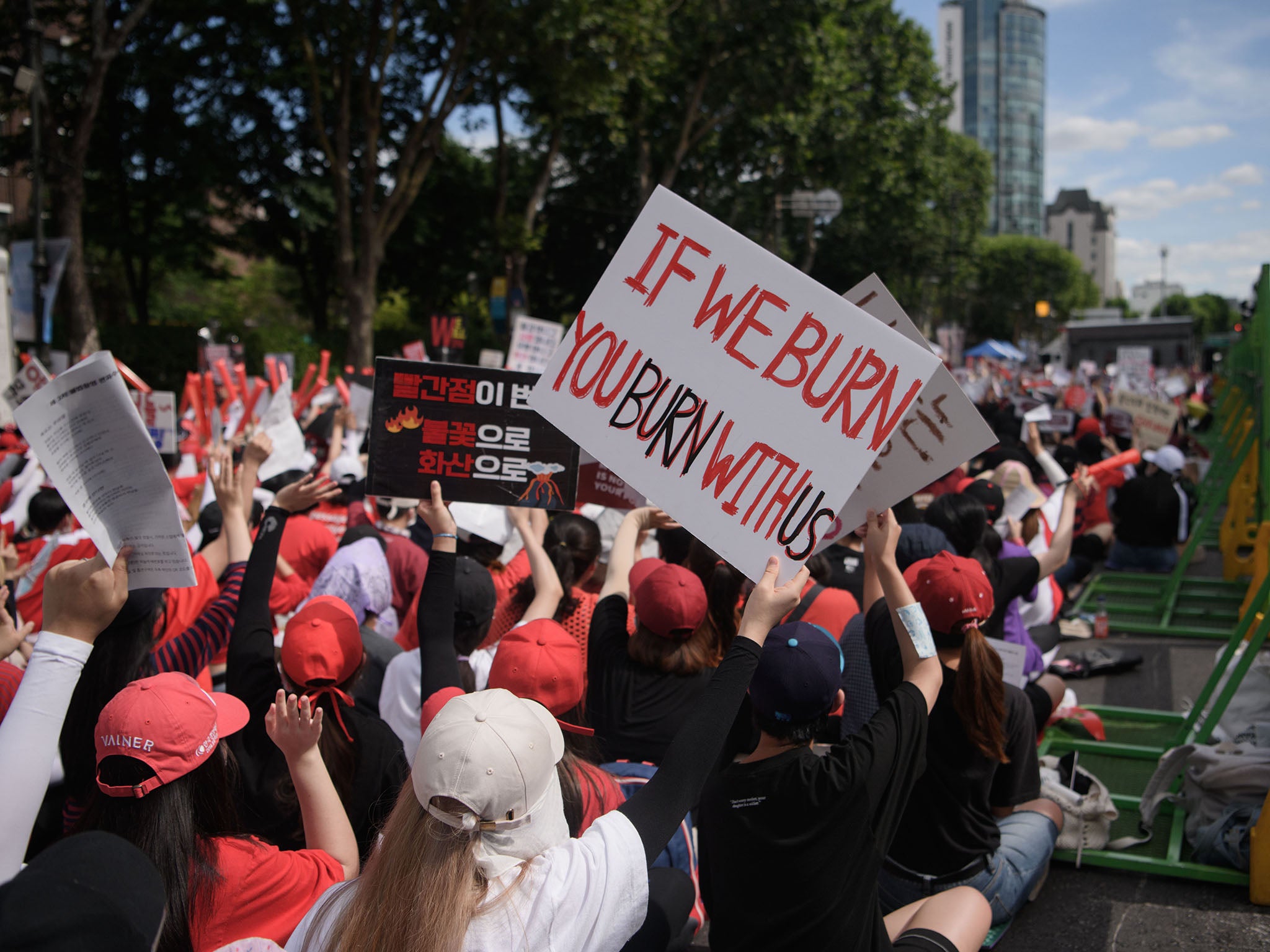 Female protesters call for South Korea's government to crack down on widespread spy cam porn crimes during a rally in Seoul on 7 July