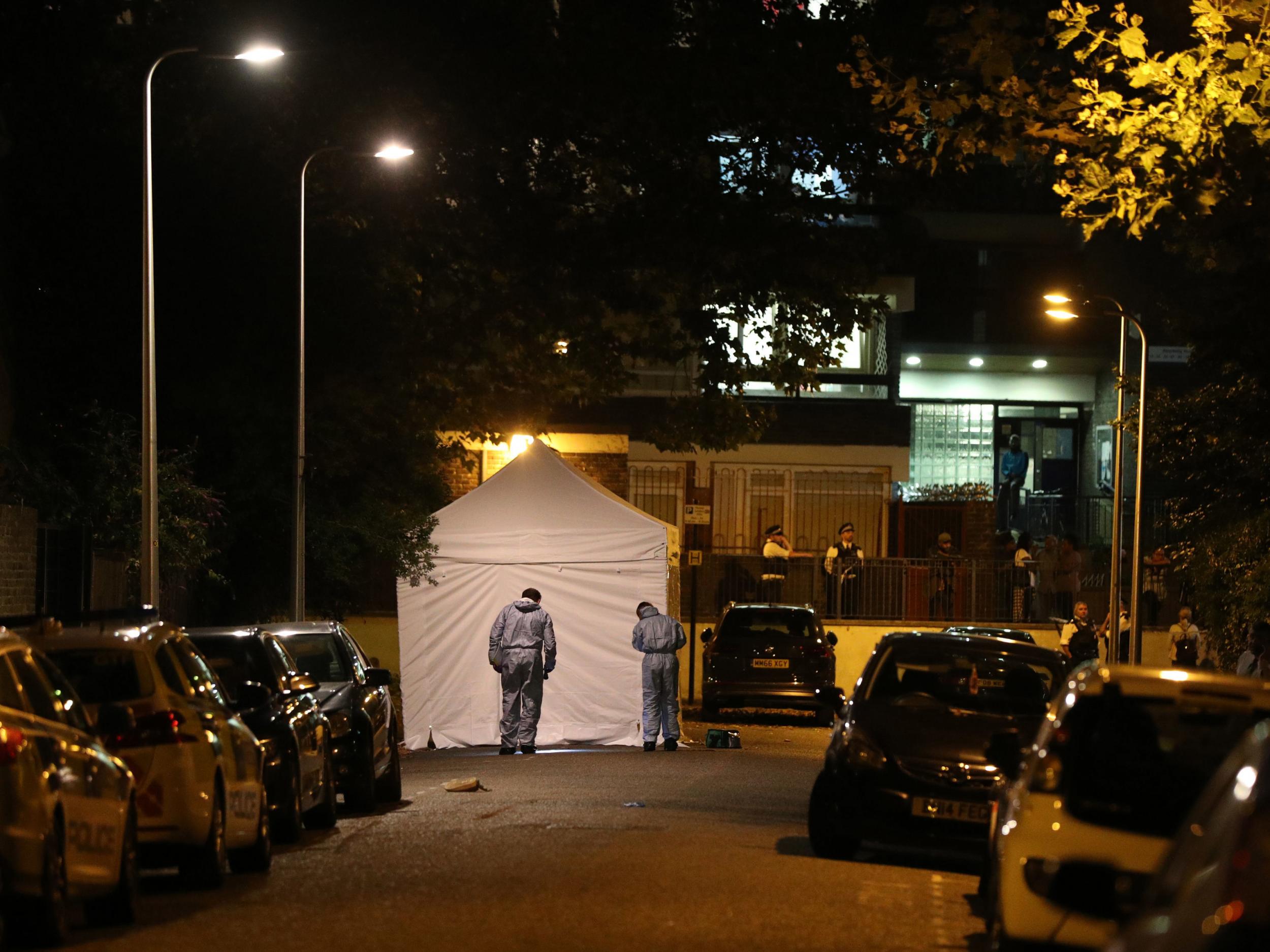 Forensic officers in Warham Street in Camberwell, south London