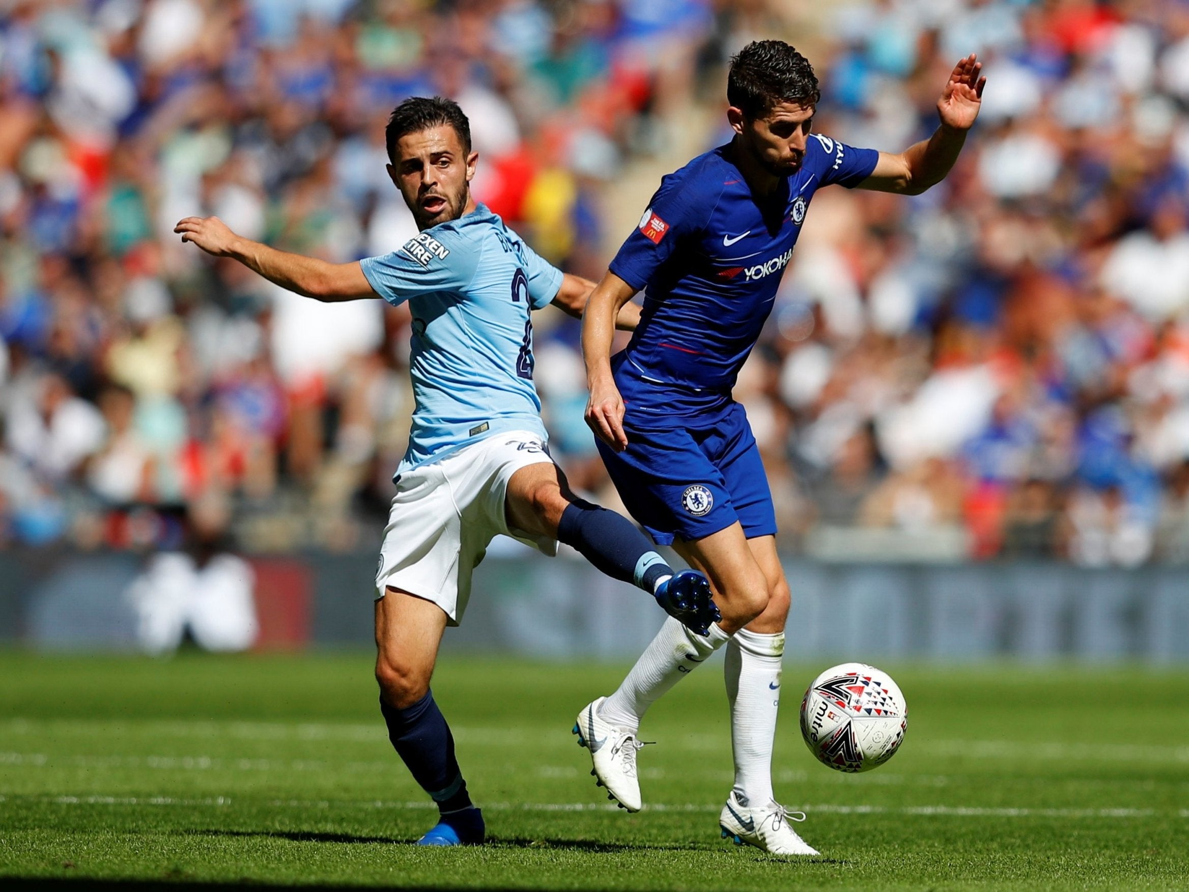 Bernardo Silva battles in midfield with Jorginho