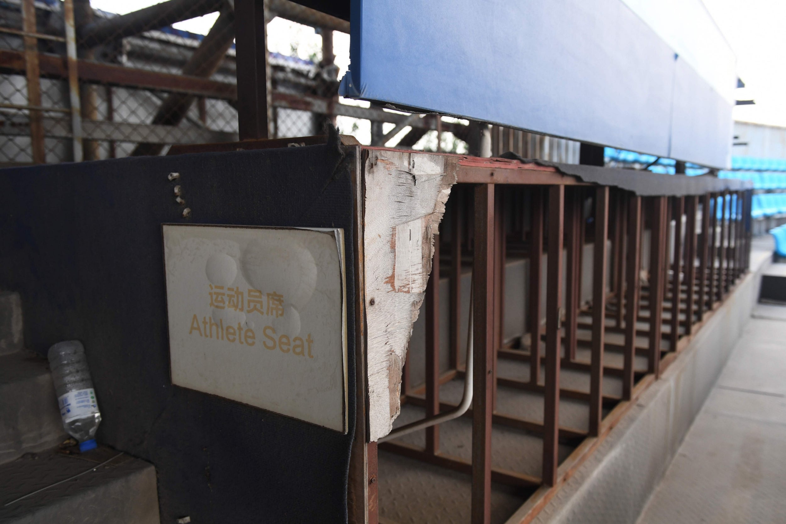 A rundown athlete seating area in the beach volleyball stadium