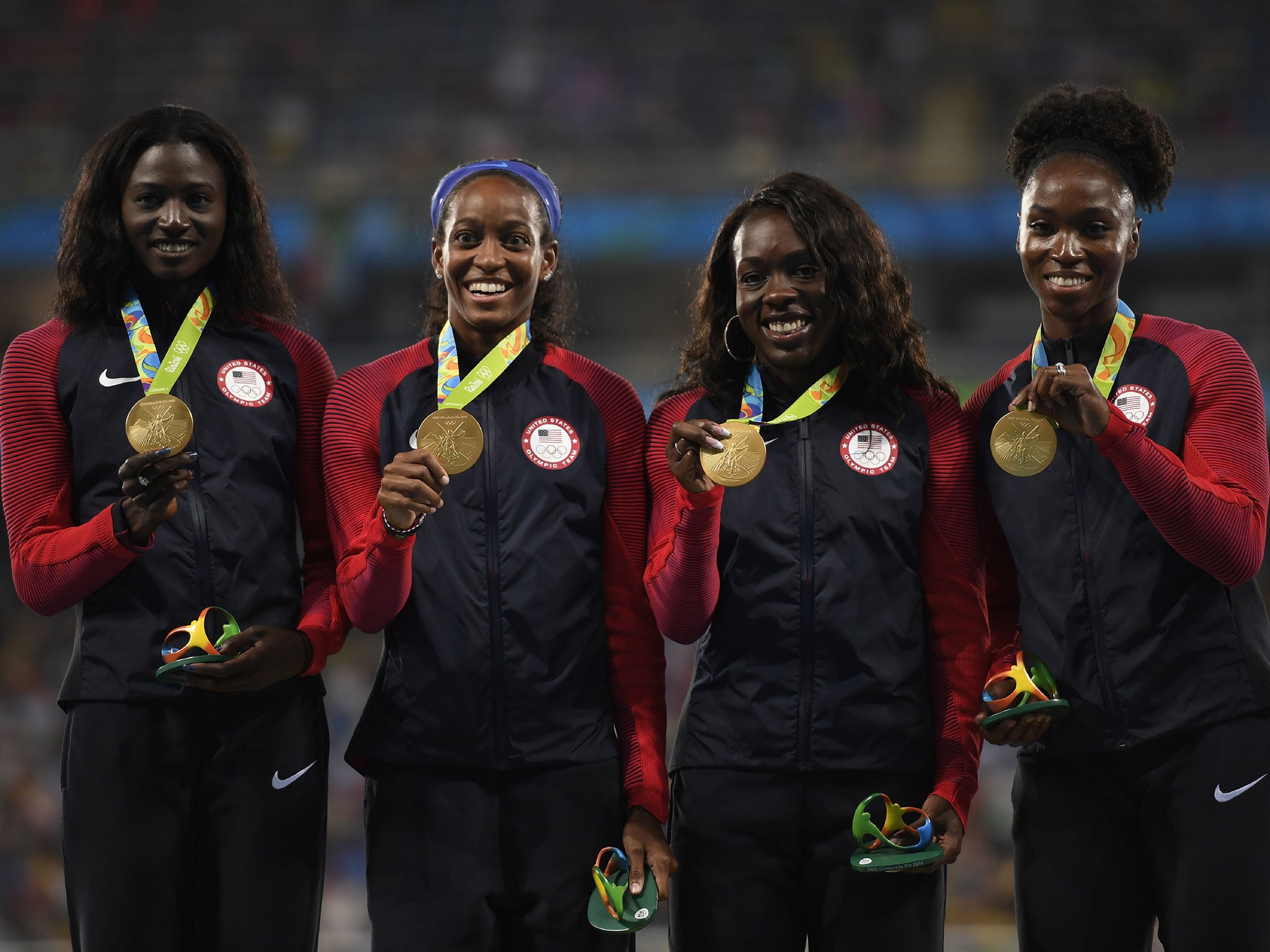 English Gardner (second left) was part of the world record-breaking relay team that won gold two years ago