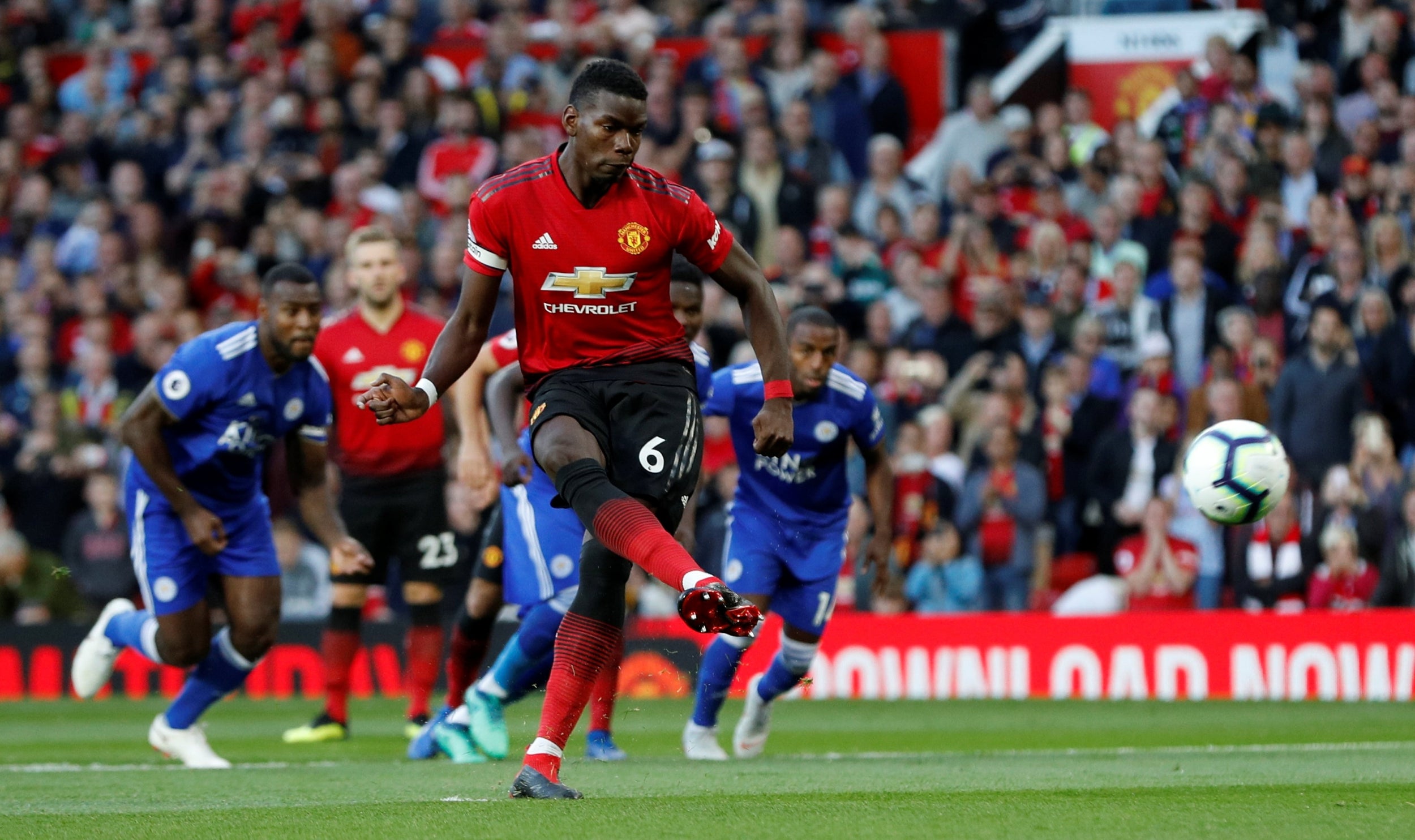 Paul Pogba slots from the penalty spot (Reuters)