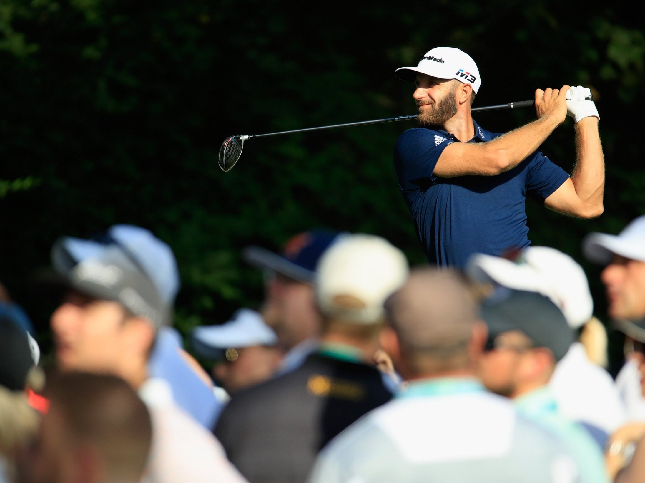 Dustin Johnson plays from the 15th tee