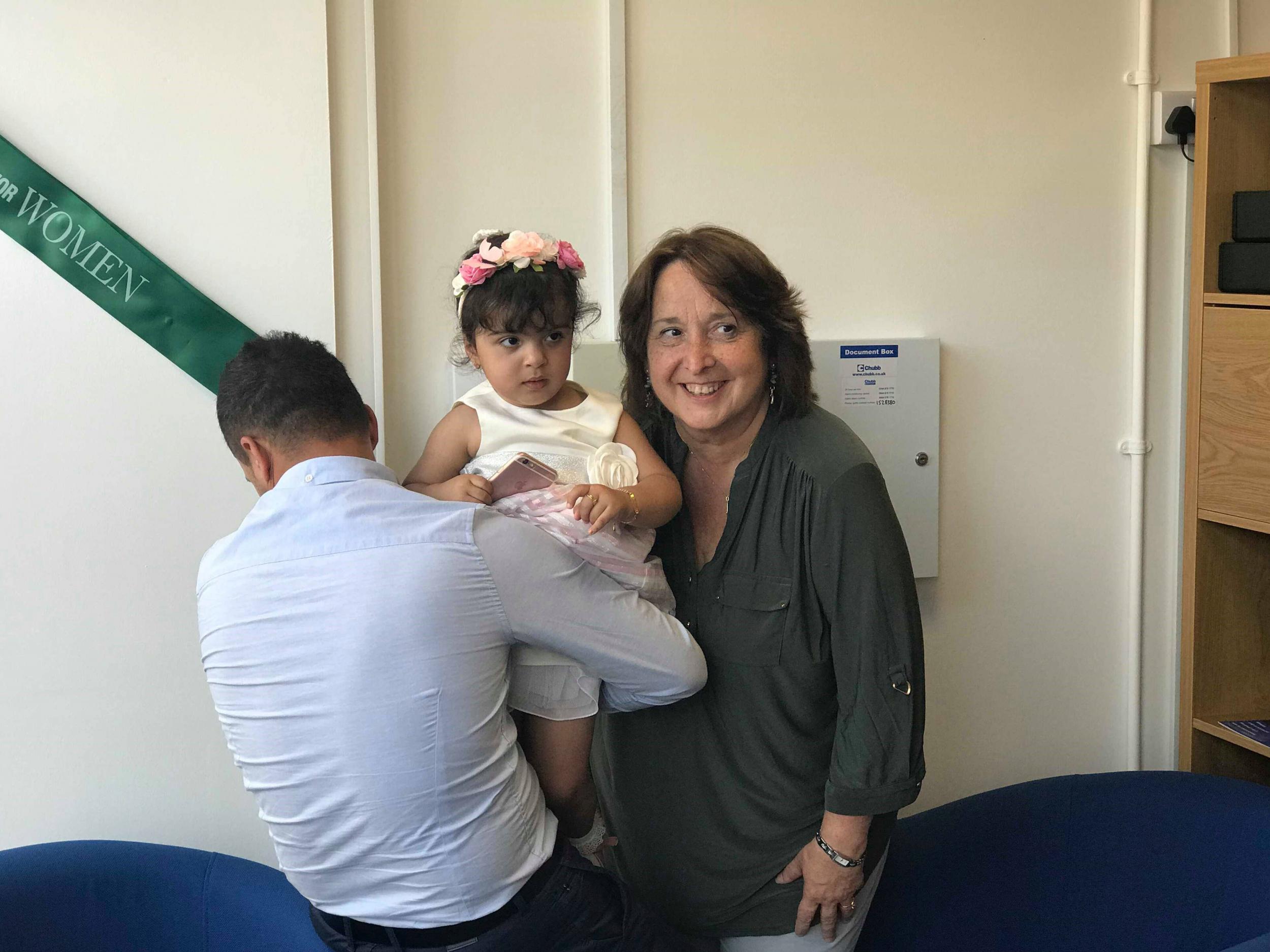 Jasem is reunited with his daughter, Lia, beside Christine Jardine