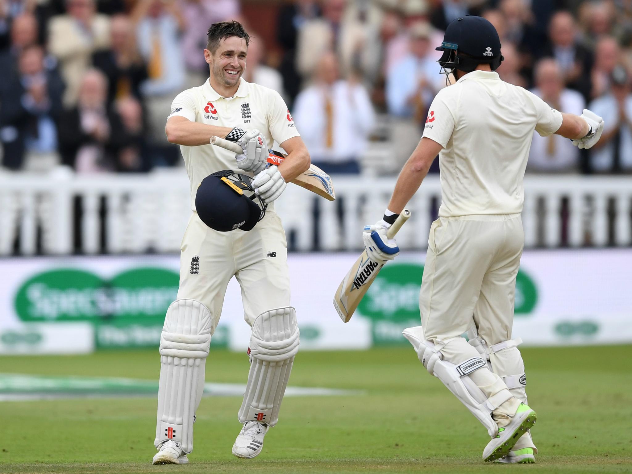 Chris Woakes celebrates after reaching his century for England on Saturday