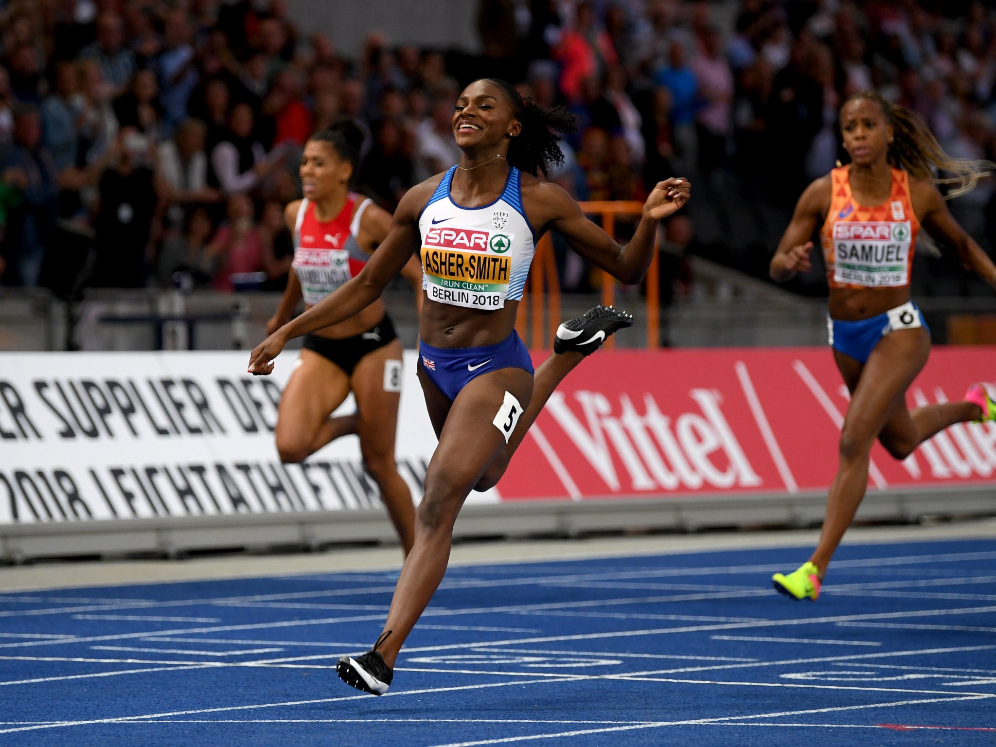 Dina Asher-Smith crosses the line to win the 200m final at the European Championships