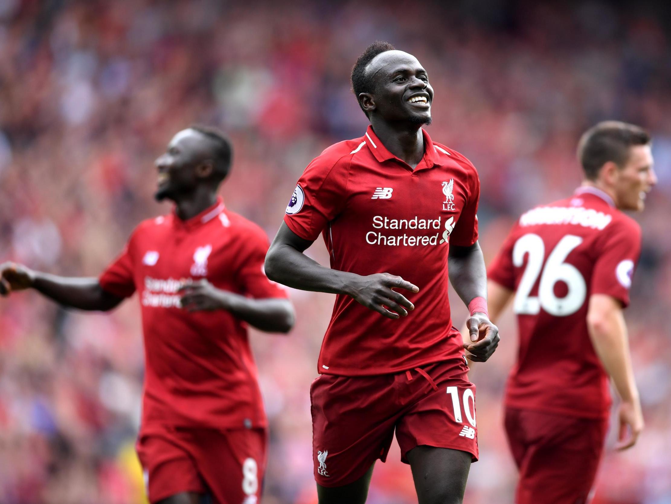 Mane scored twice as Liverpool strolled to victory