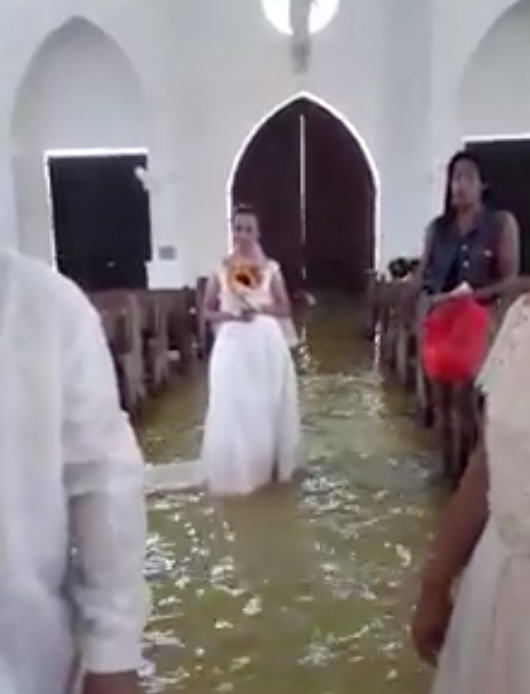 The bride didn't let the flood bother her (Facebook)