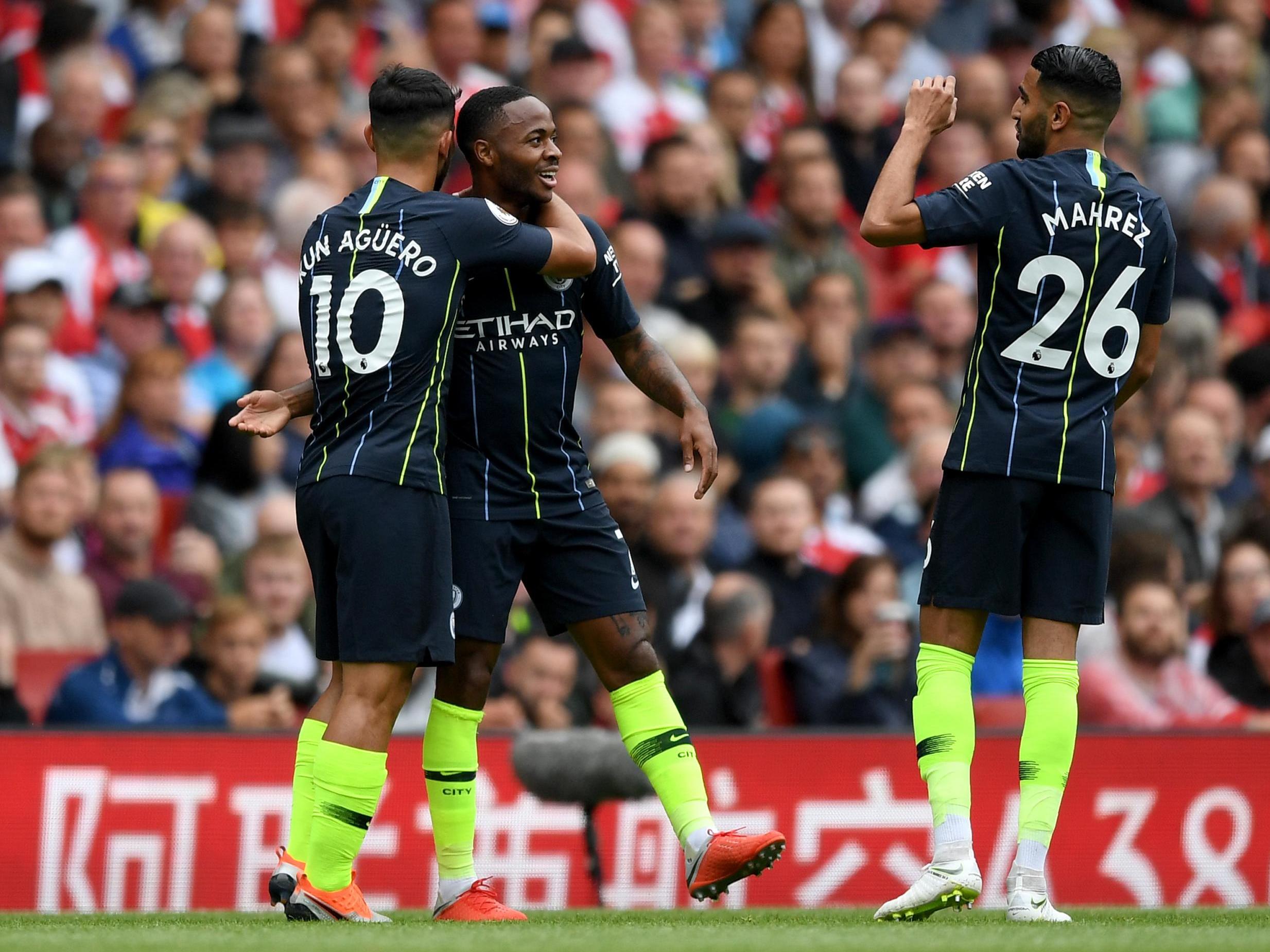 Sterling celebrates his first half goal