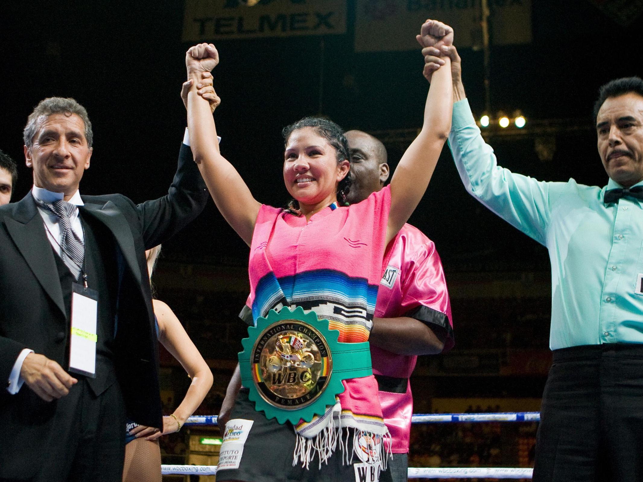 St John celebrates after beating Amy Yuratovac during the World Boxing Council (WBC) International Women Championships in Mexico City