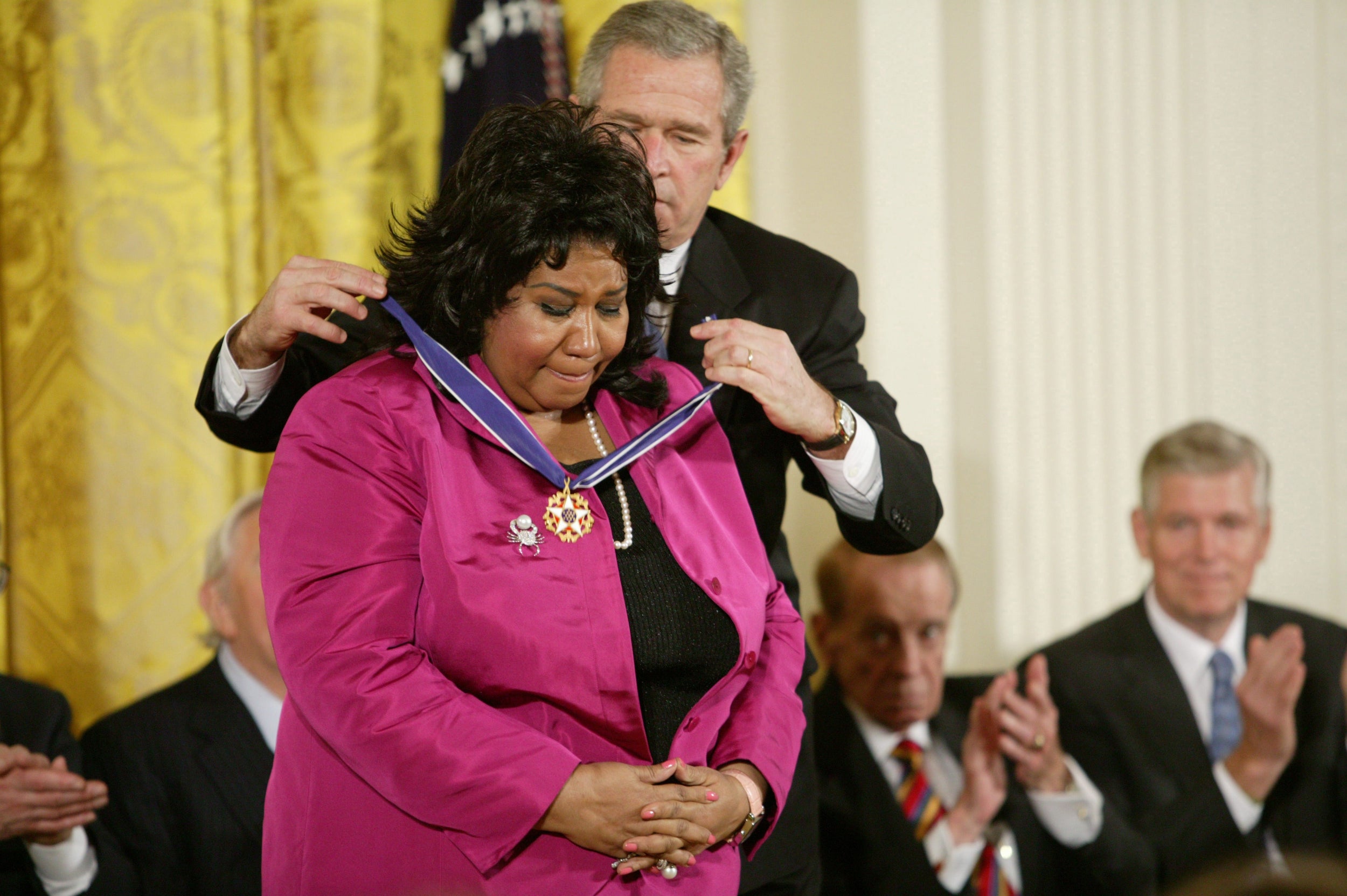 With George W Bush at the Freedom Awards ceremony in Washington in 2005