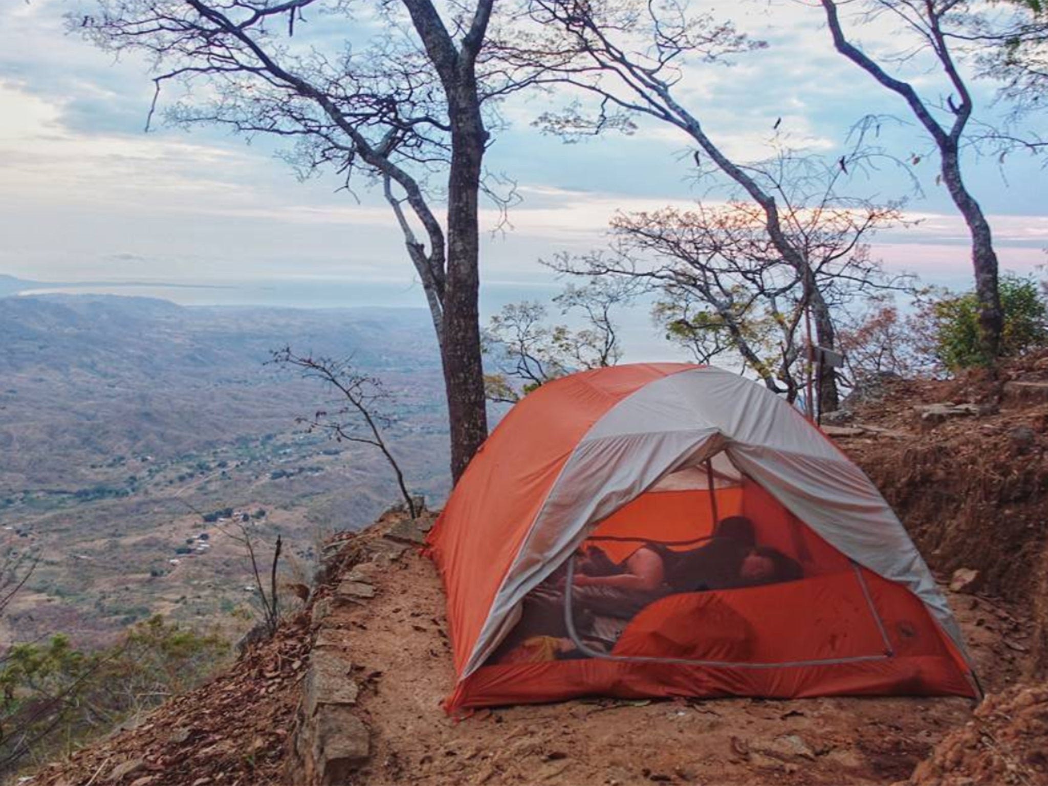 ‘We spent most of the week off the bikes at a really beautiful ecolodge in the mountains, camping right on the edge of a cliff. We woke up every morning to incredible sunrises over Lake Malawi, ate good food, and met some great people’