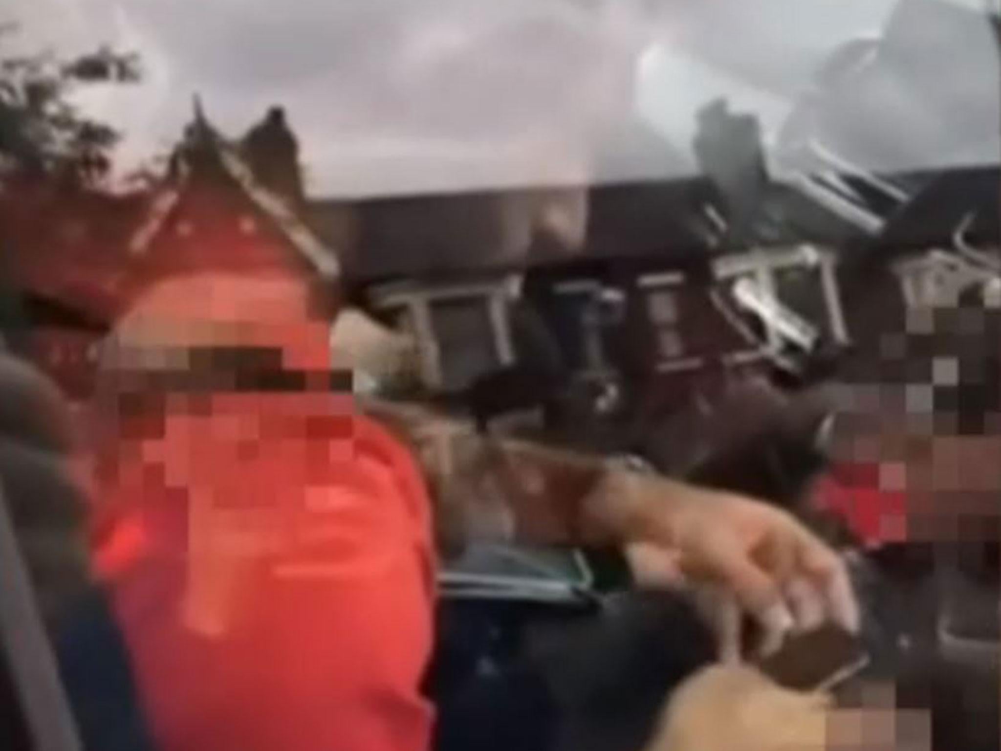 Mohamed Salah appears to use his mobile phone while driving his Mercedes-Benz